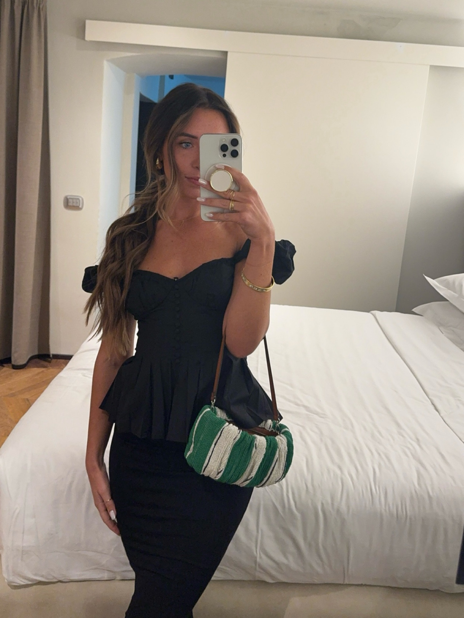 black nighttime outfit in Florence, Italy 🖤 
I’m wearing a size 4 top

Date night outfit, black maxi skirt, staud bean bag, off the shoulder shirt

#LTKTravel #LTKShoeCrush