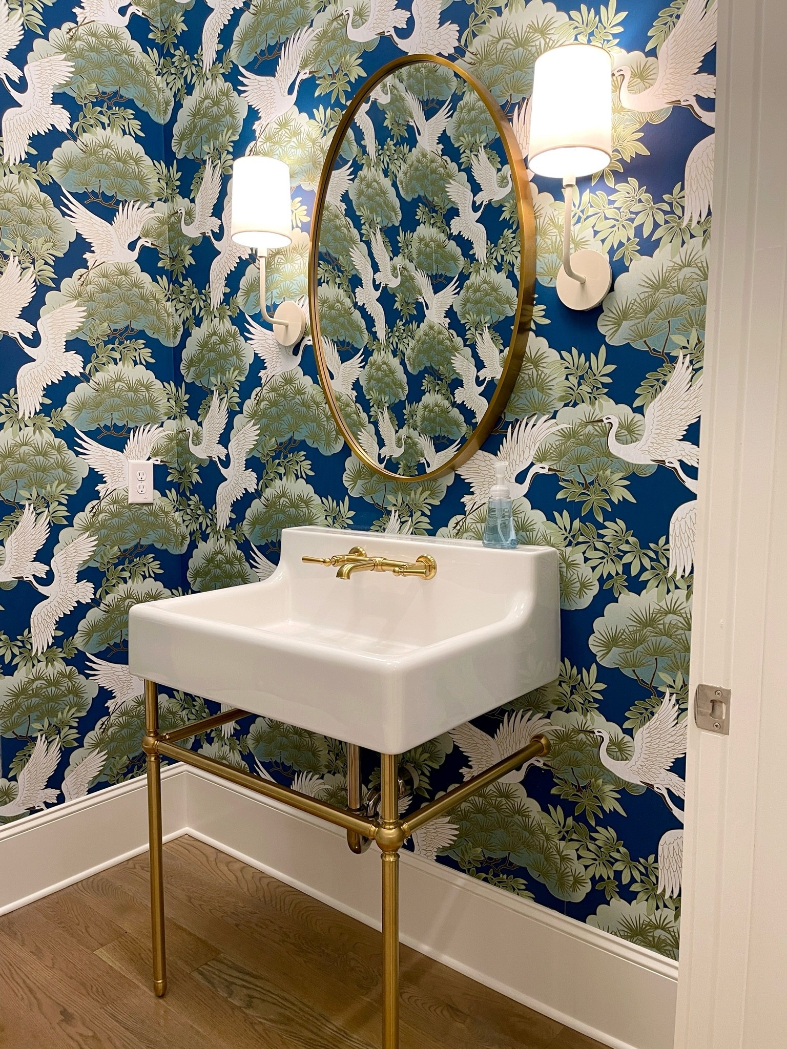 Small powder room, big personality! 😍 The Sprig and Heron Wallpaper in Navy makes such a stunning statement with its classic pattern and rich color. 💙Paired with an elegant console sink, the space feels timeless, tailored, and full of character. ✨I love how this combination transforms a small bathroom into something that feels custom and memorable. 💫 Linked the wallpaper, vanity, and inspiration sources here! 💚 #BathroomInspo #BathroomDecor #HomeInspo

#LTKHome #LTKSaleAlert