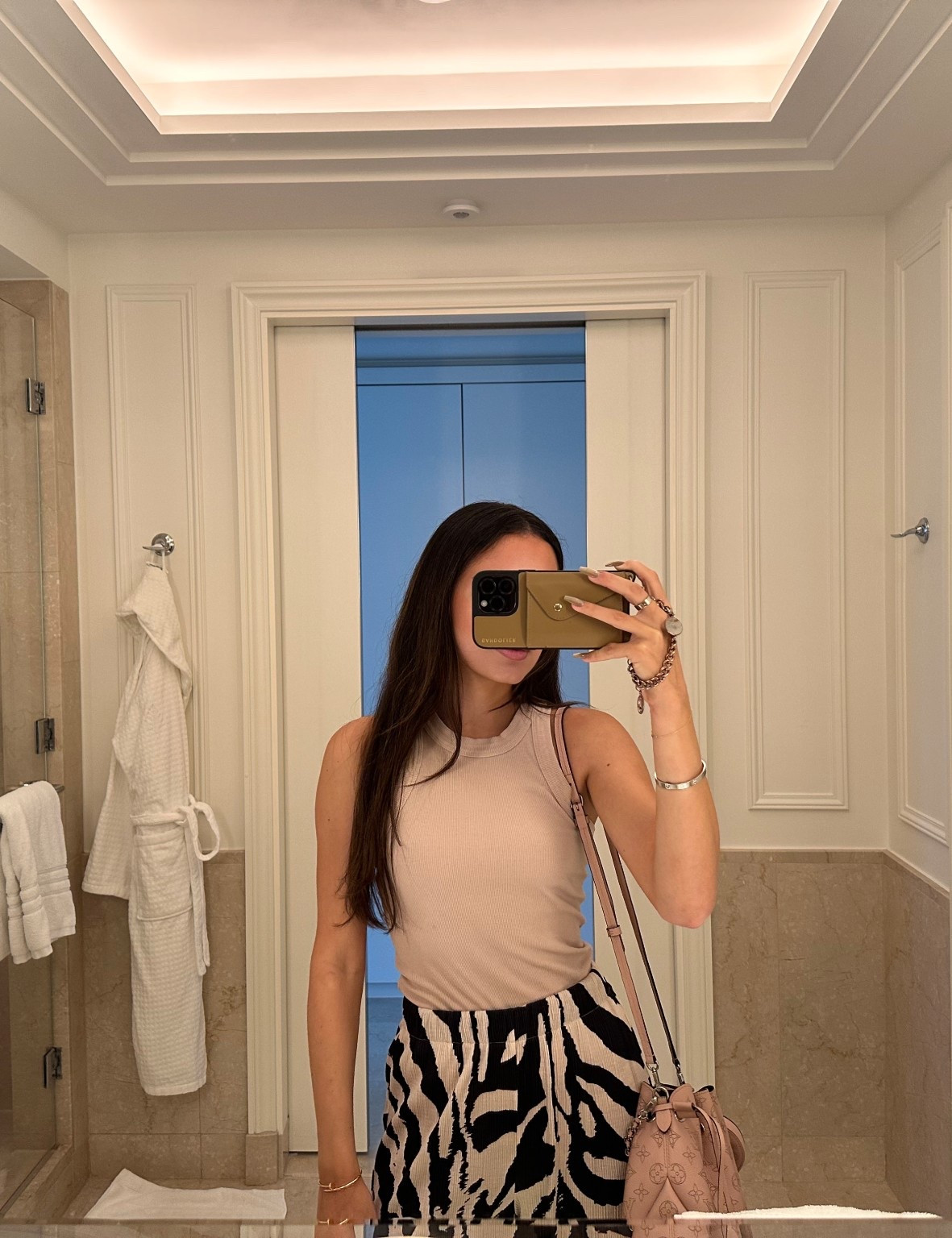 Travel day look wouldn’t be complete without my Bandolier case (keeps my id, cash, etc.) and easy to travel with because of the wristlet and crossbody strap  