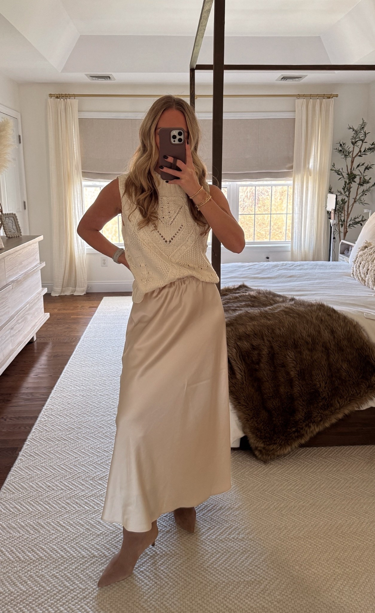 Neutral Thanksgiving outfit 🫶🏼 Turtleneck sleeveless sweater (small), satin maxi skirt & suede tall boots.

#LTKStyleTip #LTKShoeCrush #LTKHoliday