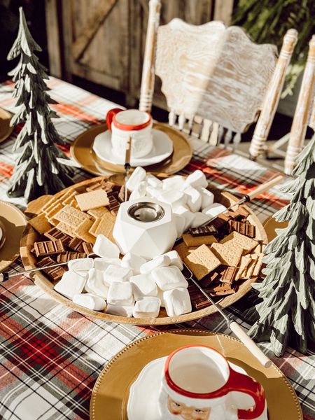 This tabletop fire pit and s’mores board was the hit of the Holiday Season for every party I brought it to!! So much fun to kids and adults enjoying this fun dessert! #smores #partyideas
#smores 

#LTKSeasonal #LTKHoliday #LTKhome
