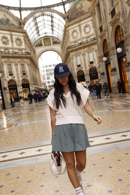 On the go outfit with blue shorts, a white jumper, and cap

#LTKstyletip #LTKeurope