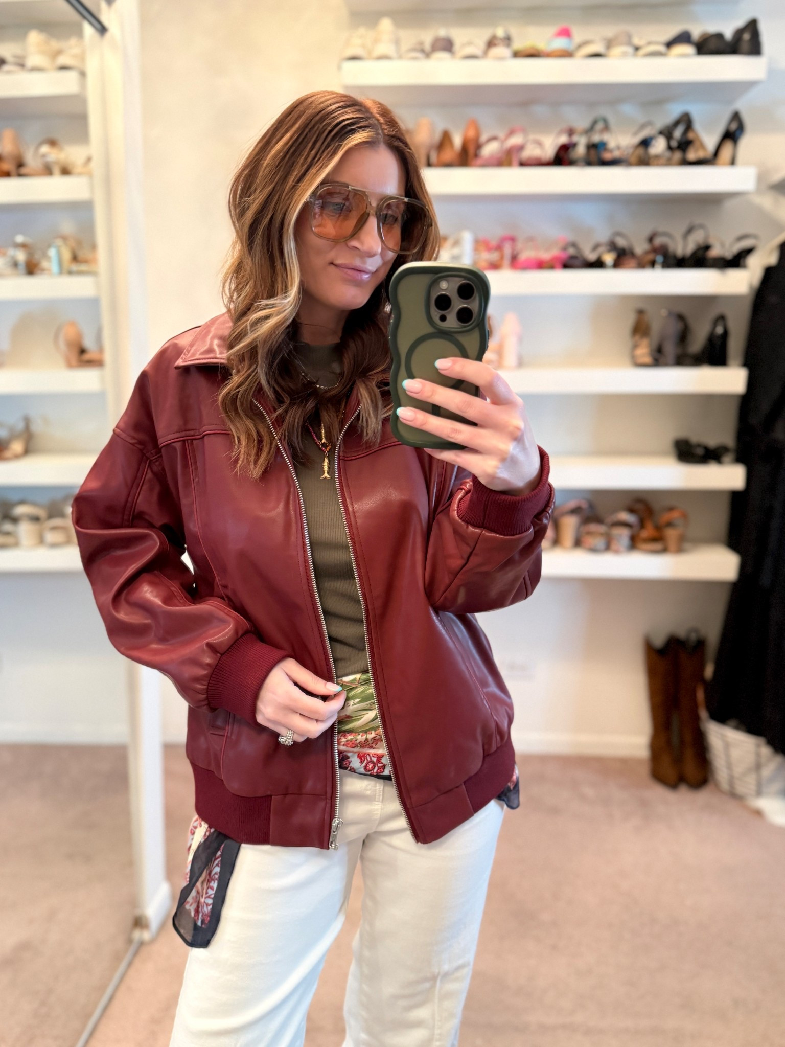 Amazon burgundy faux leather bomber jacket on sale (size medium)
Amazon short sleeve top(size medium)
Amazon white pull on wide leg jeans (size medium)
Gold earrings
DKNY jelly sandals 

Spring outfits 2026, workwear outfit, casual outfit, Work outfits, Business casual workwear, easy outfit, how to style a silk scarf



#LTKootd #LTKSeasonal #LTKSaleAlert