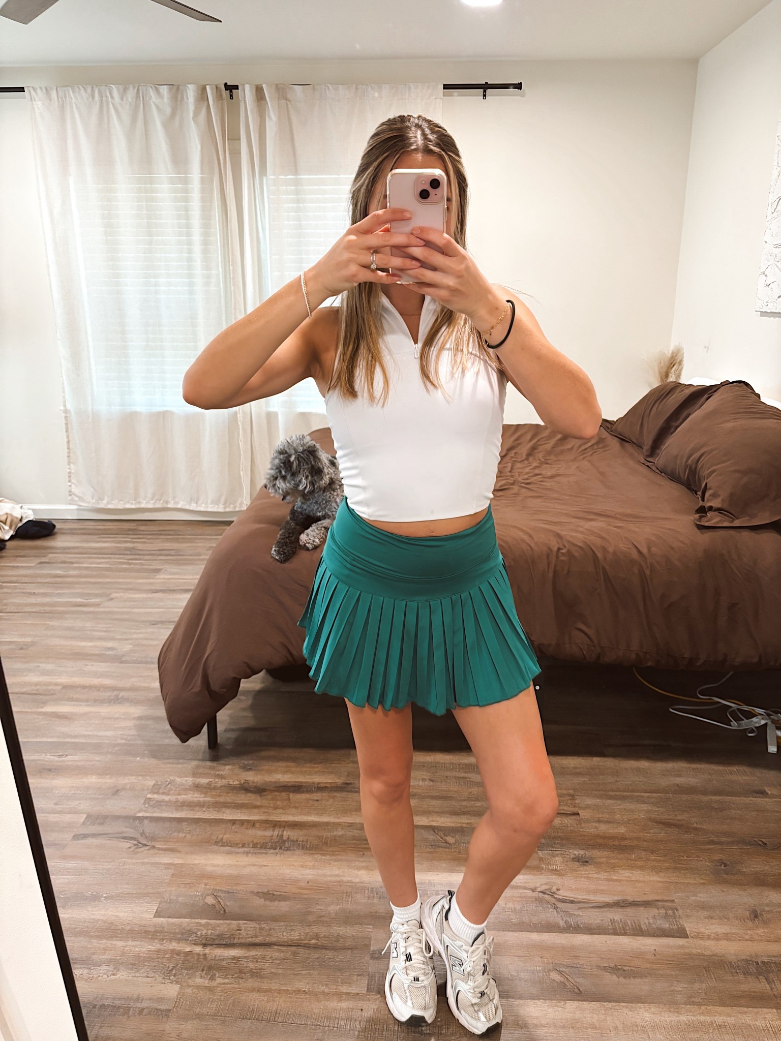 Wearing one of my favorite golf looks 🏌️‍♀️💚 This white top (Gold Hinge, size small) pairs perfectly with this green pleated skort I found on Amazon during Prime Day,such a good find! 

The color combo feels so fresh for the course, and it’s super comfortable for a full round. ⛳️🤍

#LTKU #LTKSeasonal #LTKActive