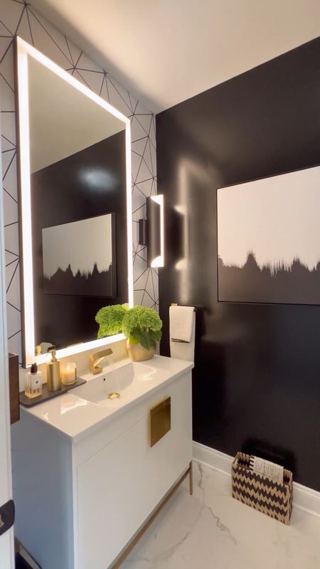 A MOODY Powder bathroom transformation with wallpaper and decorative accents #bathroomdecor #beforeandafter #wallpaper #bathroomtransformation #bathroomvanity

#LTKhome #LTKsalealert