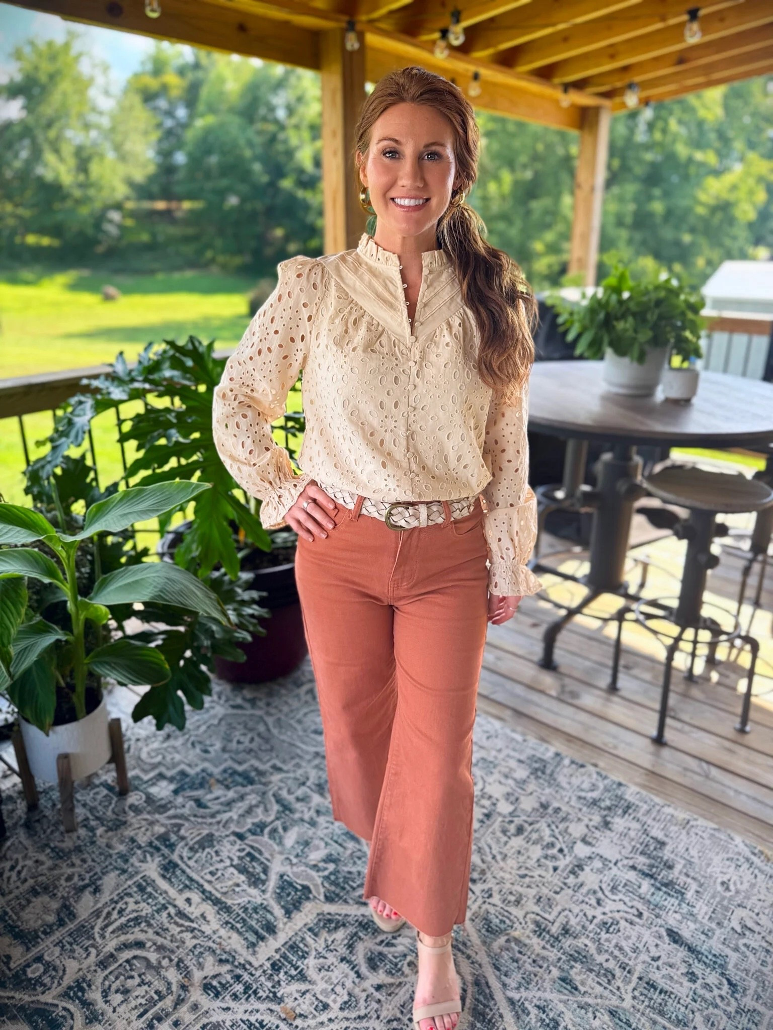 As if you needed another reason to go ahead and snag these rust colored jeans! This eyelet top and wedge sandals elevate this look for a more sophisticated outfit. The top comes in several other colors and she’s wearing a small. These jeans also come in several colors and are a 4. 

#LTKPetite #LTKWorkwear #LTKStyleTip