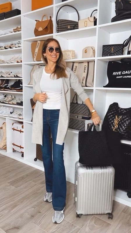 Travel / airport outfit idea 
For warmer places 
Love these jeans , they are ultra stretchy and comfortable . Use code : ALINEXSPANX for 10 % off 
The cardigan is light and stylish, has pockets 
The sneakers are my obsession lately 
Comfortable and so light 
Everything fits true to size 

#LTKitbag #LTKstyletip #LTKshoecrush