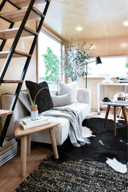 This lofted tiny home brings in beautiful real wood and modern minimalist design. Mix and match our designers find to create this beautiful space in your own home. 

#LTKhome #LTKstyletip #LTKtravel