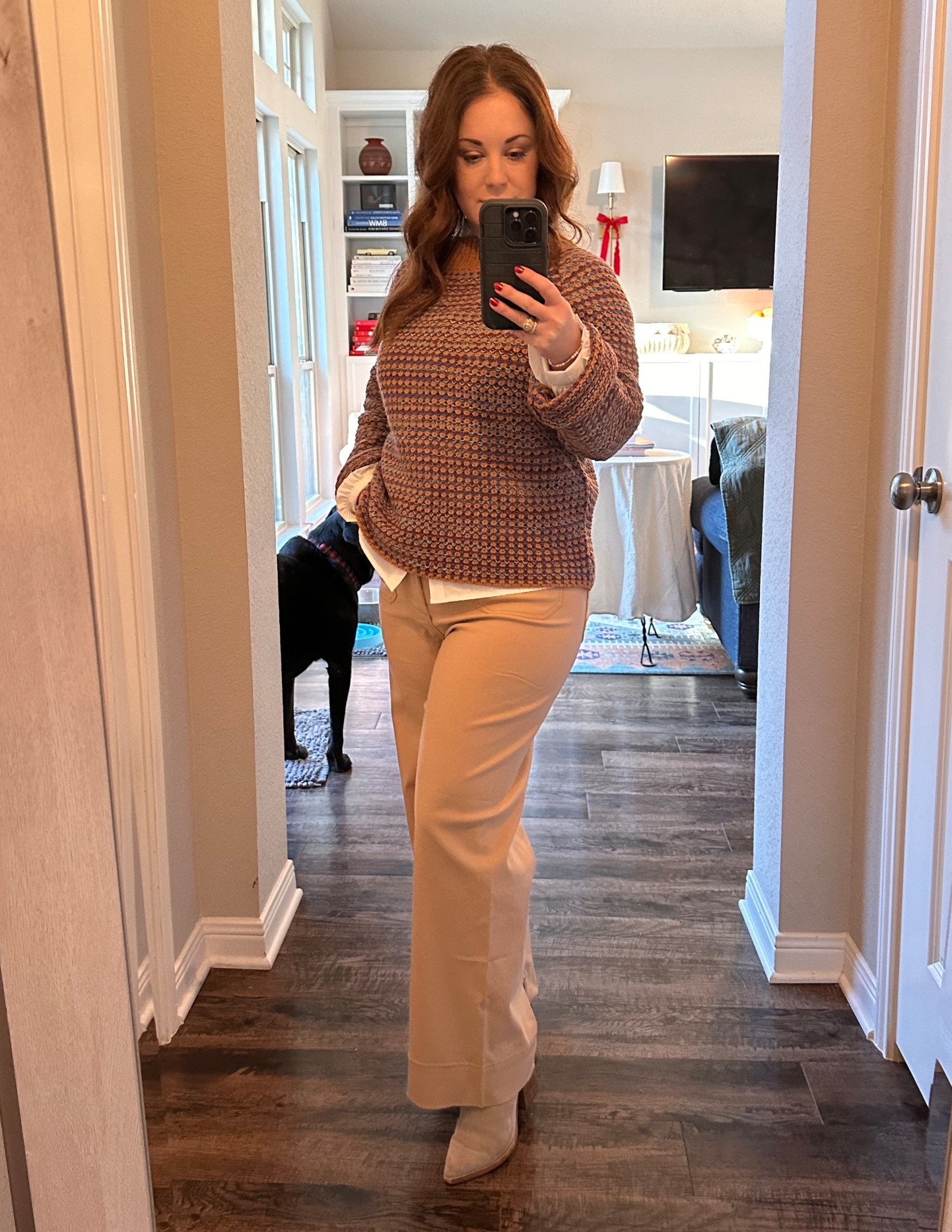 Casual office outfit with neutral pants and sweater layered with a classic white button down. 

#LTKootd #LTKmomlife #LTKOver40