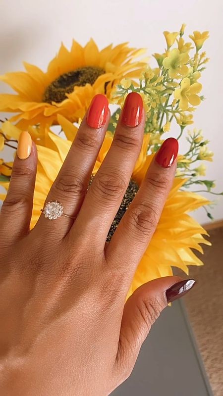 Looking for cute Fall nail designs? This color combination is giving autumn! From brown, red, burnt orange and yellow just like the leaves in Fall. 

#LTKbeauty #LTKSeasonal #LTKunder50
