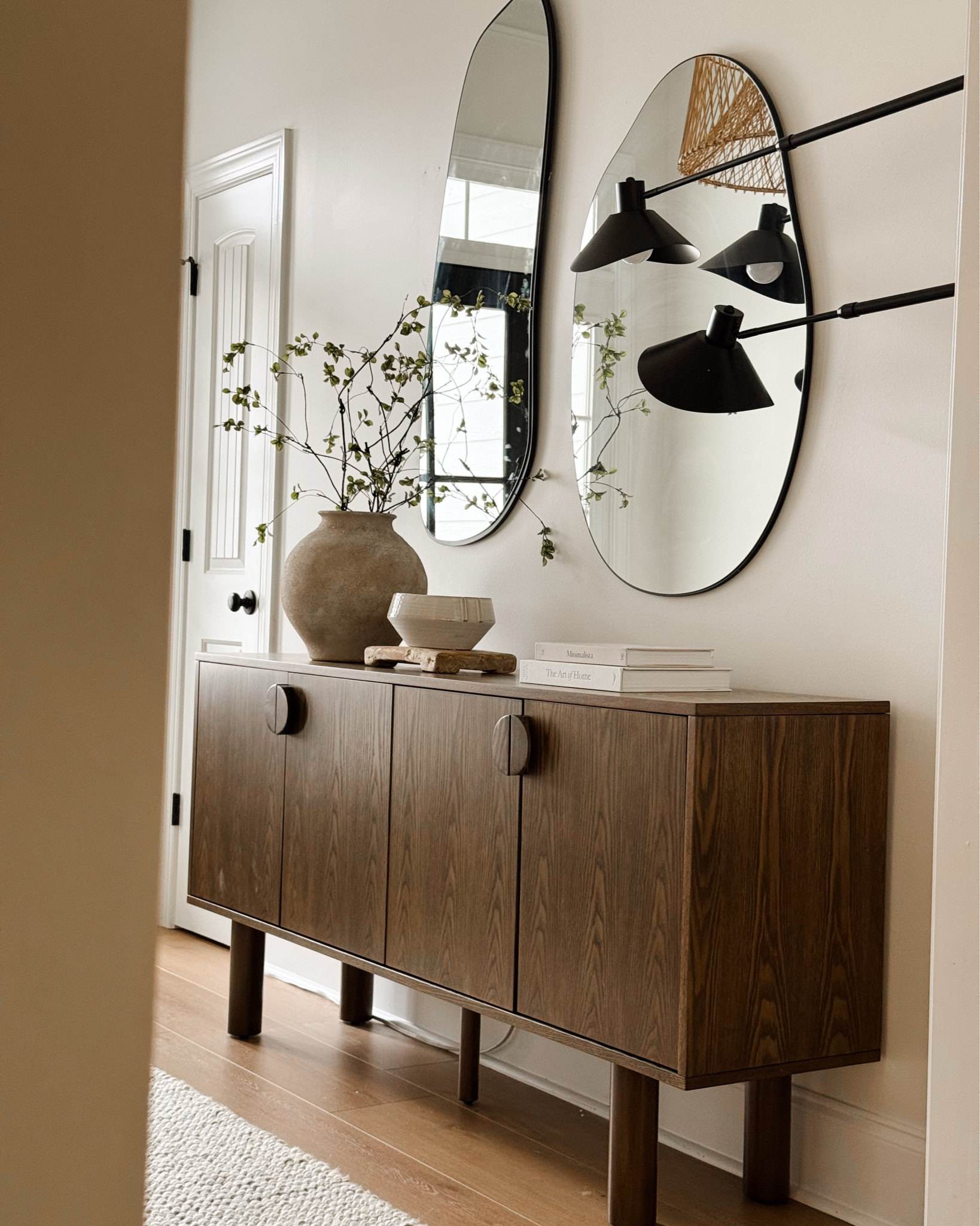 Did a little entryway refresh & I looooove - this cabinet is an actual 10/10. can't recommend it enough!!!

Mirrors are size 46x18 & 38x26

The stems come with a pack of 4 & I used all four!

Pedestal is from an antique store 

 

#LTKHome