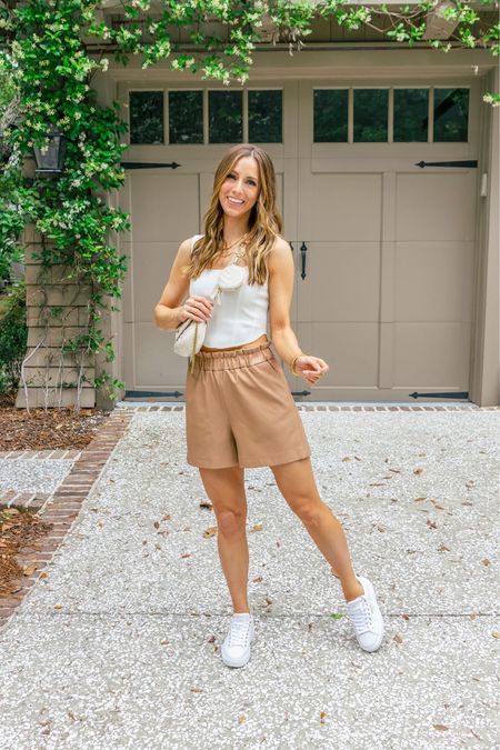 These shorts are summer and fall go tos for me! I instantly feel elevated every time I put them on! 
I’m wearing a size small.
Sneakers fit TTS.

Casual summer outfit | leather shorts | casual outfits | everyday outfit | easy outfit ideas | white sneakers | white sneakers outfit


#LTKSeasonal #LTKStyleTip #LTKFindsUnder50