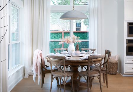 S P R I N G Ready  | Crisp white and pastel pink give the breakfast room a much needed refresh to await the season! 

🌸Paint: SW Alabaster
🌸Flooring: The Masters Craft, Harroway
🌸Link in bio for product sources and ideas

#breakfast room
#grey pendant light
#lighting
# studio mcgee pendant #breakfast table
#breakfast room remodel
#linen drapes
#curtains
#spring decor 

#LTKSeasonal #LTKhome