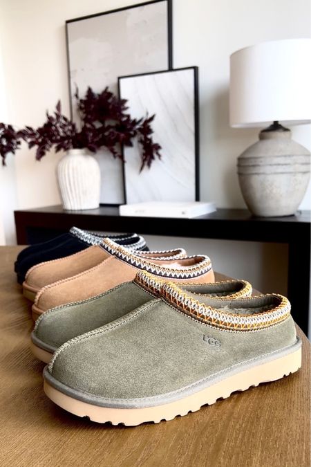 Let's chat about Ugg heaven, shall we? 😍 The Tasman Slippers are my absolute faves – like little hugs for your feet! And don't even get me started on the Ugg Classics, they're classics for a reason. Now, I'm a size 7.5, but the size 8 fits like a dream. scroll down below to shop and treat yourself to the comfiest luxury ever!
#uggs #shoesforfall #womenshoes 

Chestnut Ugg
Burnt Olive Ugg 
Black Uggs#LTKSale

#LTKsalealert #LTKGiftGuide