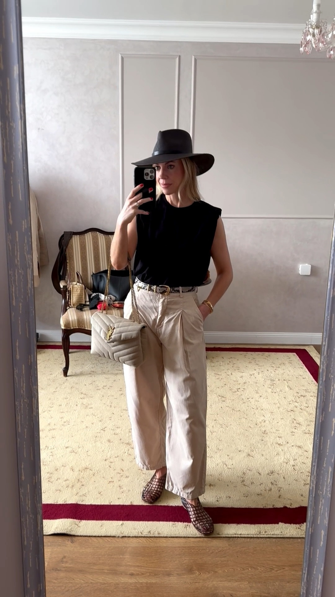Summer outfit, vacation outfit, travel outfit, black muscle tee, pleated cropped pants, snakeskin belt, jelly shoes (under $25)

#LTKSeasonal #LTKTravel #LTKOver40
