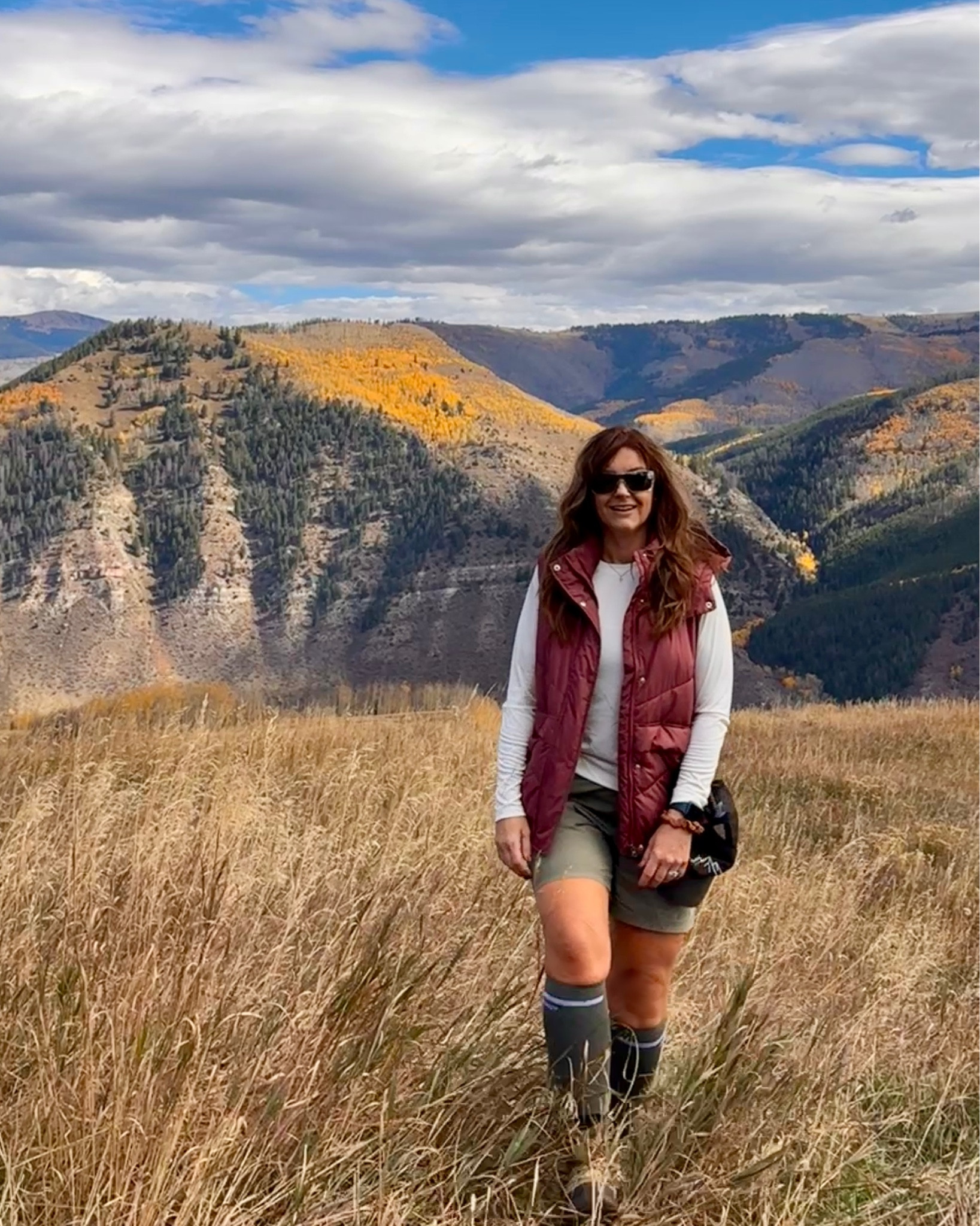Hiking Colorado 
Wearing medium in vest
medium in top (found at The North Face outlet store; linked similar options) 
Shorts are large 

#rachealbrush fall hiking, mountain hiking, hiking boots, puffer vest, hoodie vest, compression socks, Oakley sunglasses 

#LTKSeasonal #LTKActive #LTKOver40