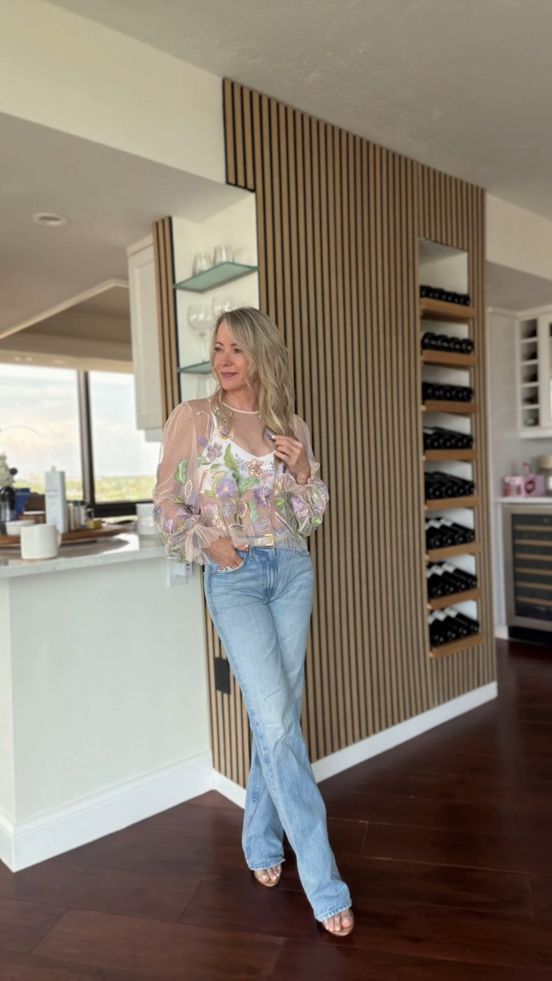 A pretty blouse instantly elevates your favorite pair of jeans. 🌸✨

This embroidered sheer top is one of those pieces that feels special but is easy to style for everyday. I paired it with relaxed light-wash denim, neutral heels, and delicate jewelry for a look that’s feminine, effortless, and perfect for lunch, date night, or a summer event. Im on a xxs for reference!

#LTKootd #LTKgrwm #LTKOver40