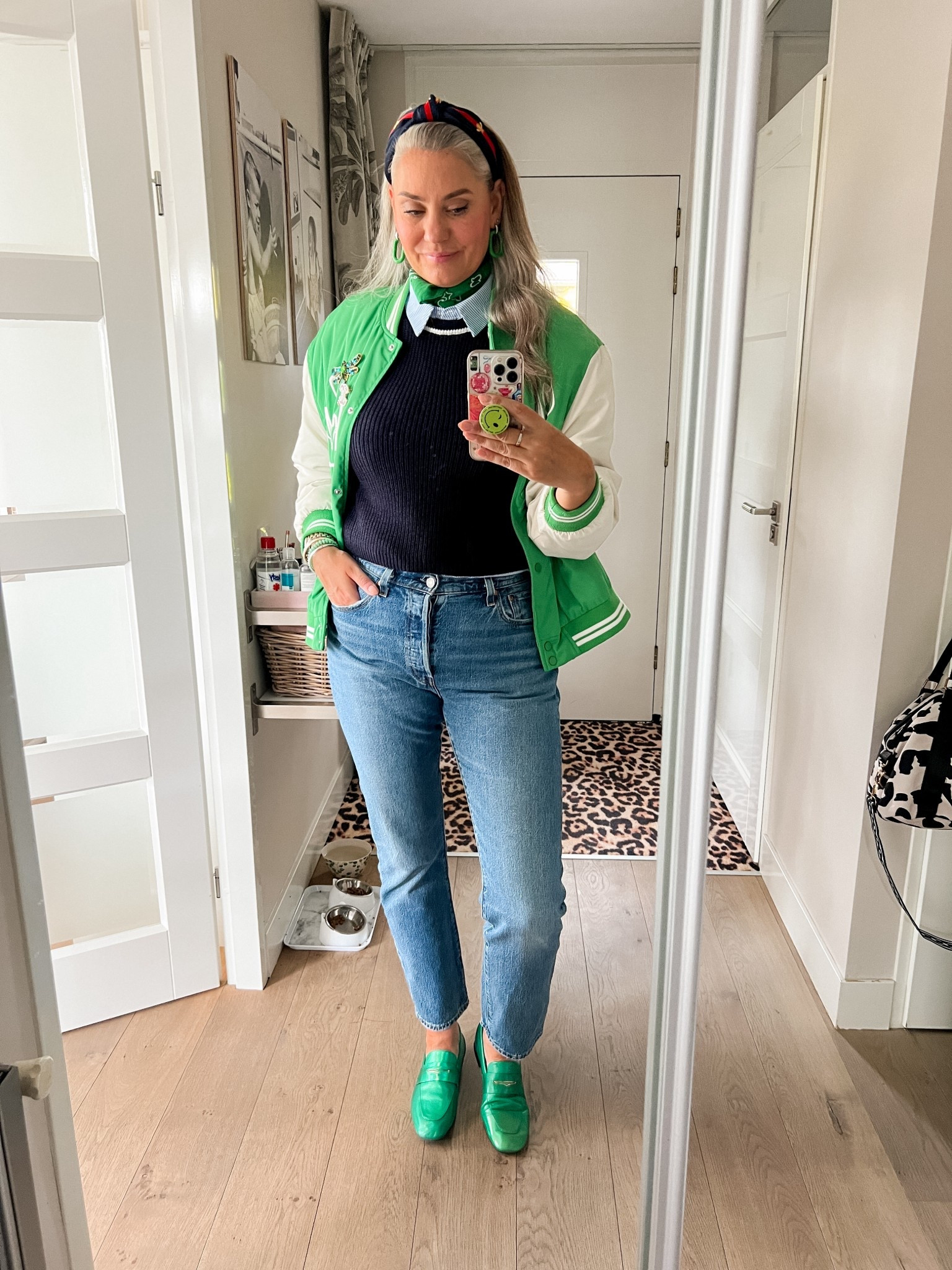 Ootd -Saturday. Blue striped blouse (Norah, 42) under a navy blue Spencer (H&M, M) paired with Levi’s 501 jeans, green loafers (local boutique) and a green varsity jacket (old Primark). Green bandana, GG inspired headband. 

#LTKeurope #LTKnederlands #LTKspring