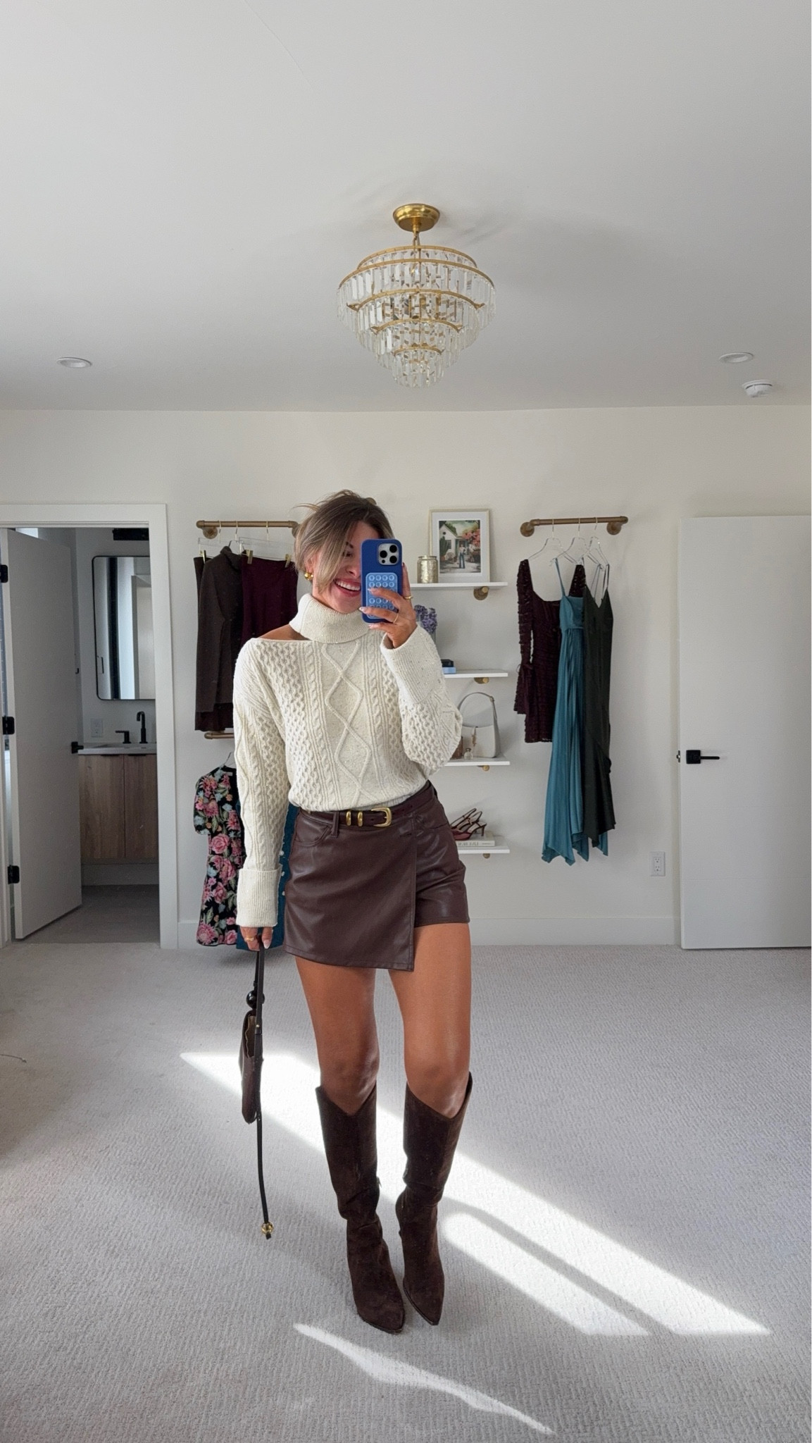 Walmart capsule collection brown leather skort styled for fall with cream turtle neck sweater.

Wearing a small in all. 

#LTKSeasonal #LTKStyleTip #LTKFindsUnder50