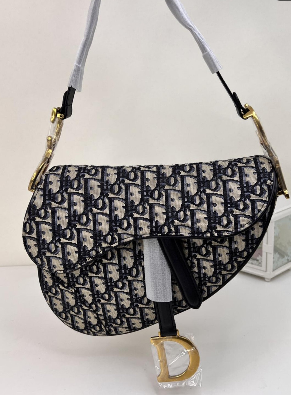 dhgate monogram dior saddle bag for $50 (color 2) but they have solid color options as well

#LTKGiftGuide #LTKSaleAlert #LTKFindsUnder100