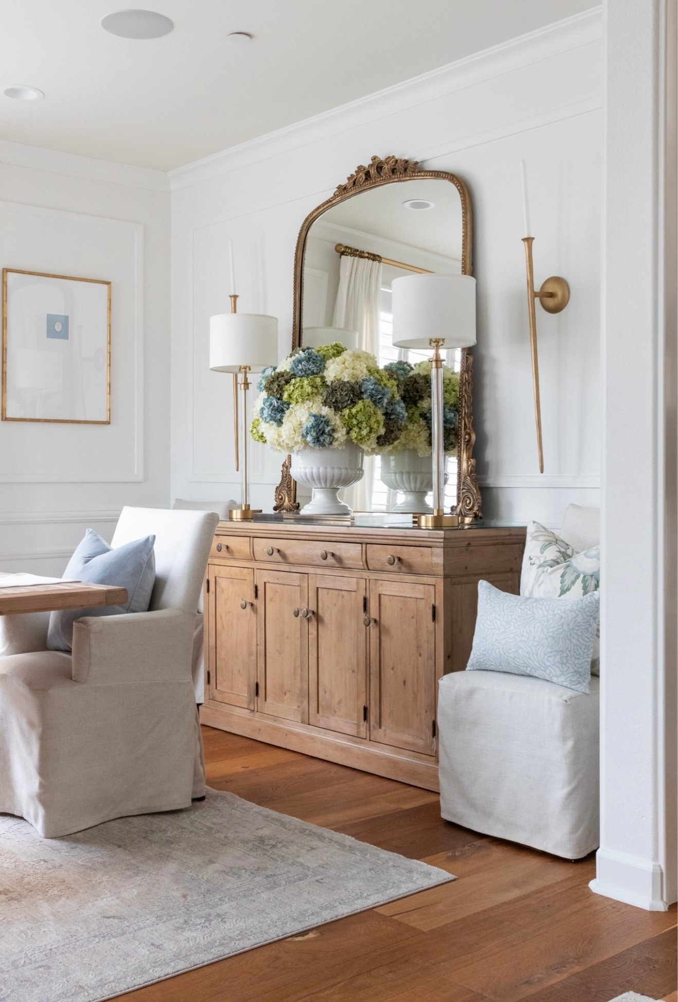 Shop my dining room💛 hydrangeas, flower arrangement, faux flowers, dining room decor, home decor, throw pillows, buffet, buffet lamps, gold sconces, gold mirror, intaglios, framed art, blue, and white, summer, fall, sale alert

#LTKHome #LTKSeasonal #LTKFindsUnder50