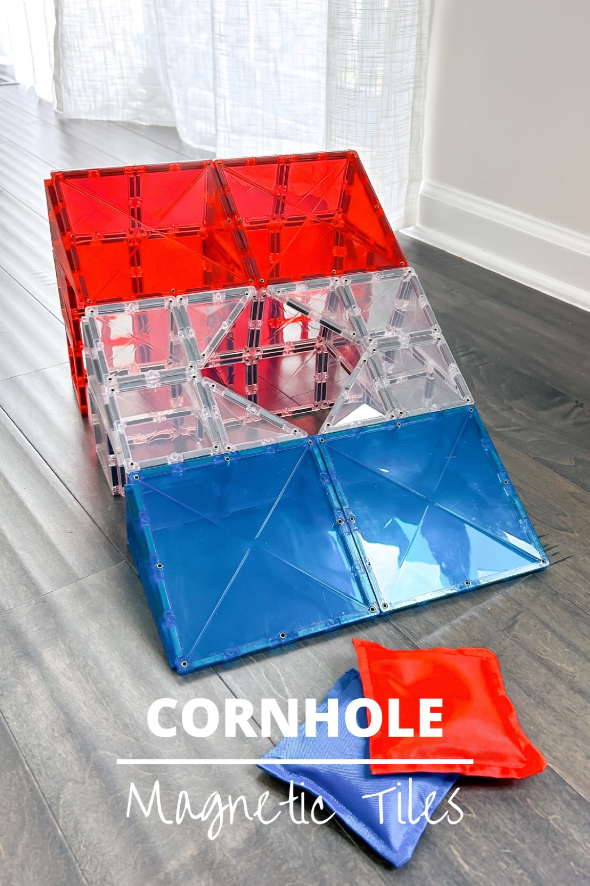 Looking to spice up game night? Try making a magnetic tile cornhole game! Just take turns tossing fabric bean bags, rolled-up socks, or a little stuffed animal. Score points by landing a bag/sock/soft toy on the board or getting it through the hole.

Discover this cornhole game and 49 other engaging play ideas in my book, “Magnetic Tiles STEM Play Ideas.” Perfect for parents and educators, this book is your go-to resource for creating exciting magnetic tile builds with your kids  

#LTKparties #LTKfamily #LTKkids