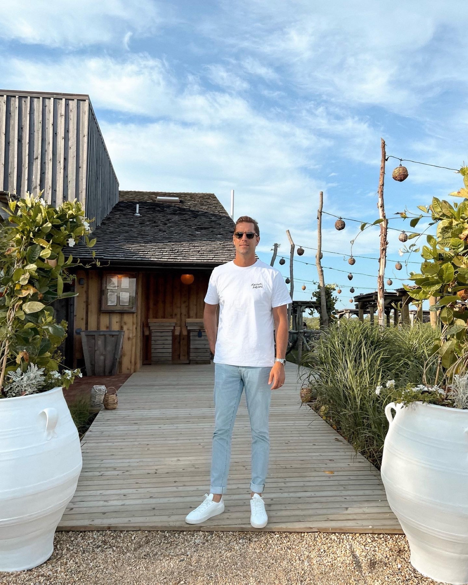 Kat Jamieson shares a classic outfit for men including a white shirt and sneakers. White sneakers, classic shirt, light wash jeans, sustainable, tennis shoes, classic outfit for men, summer style.

#LTKstyletip #LTKmens #LTKSeasonal