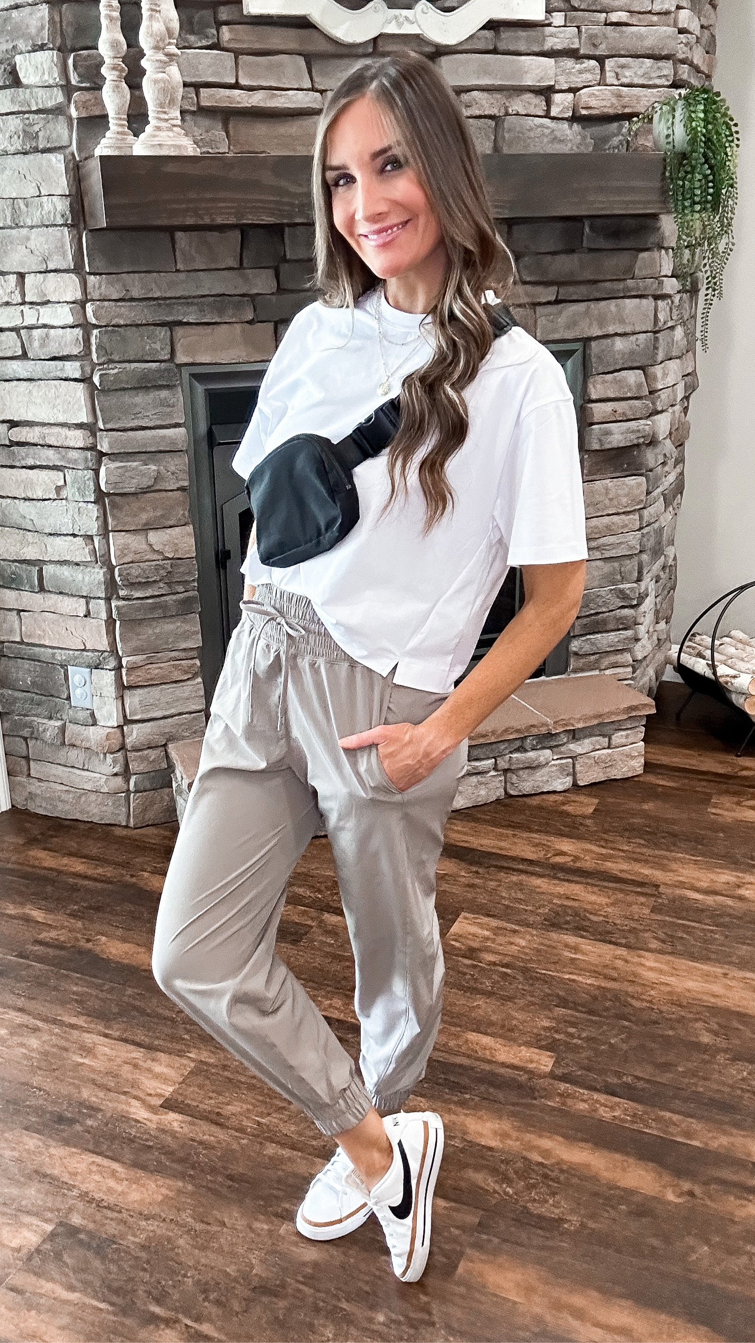 Casual outfit styling, joggers, neutral joggers, oversized cropped tee, athleisure look, belt bag, Nike court legacy 

#LTKunder50 #LTKstyletip #LTKsalealert