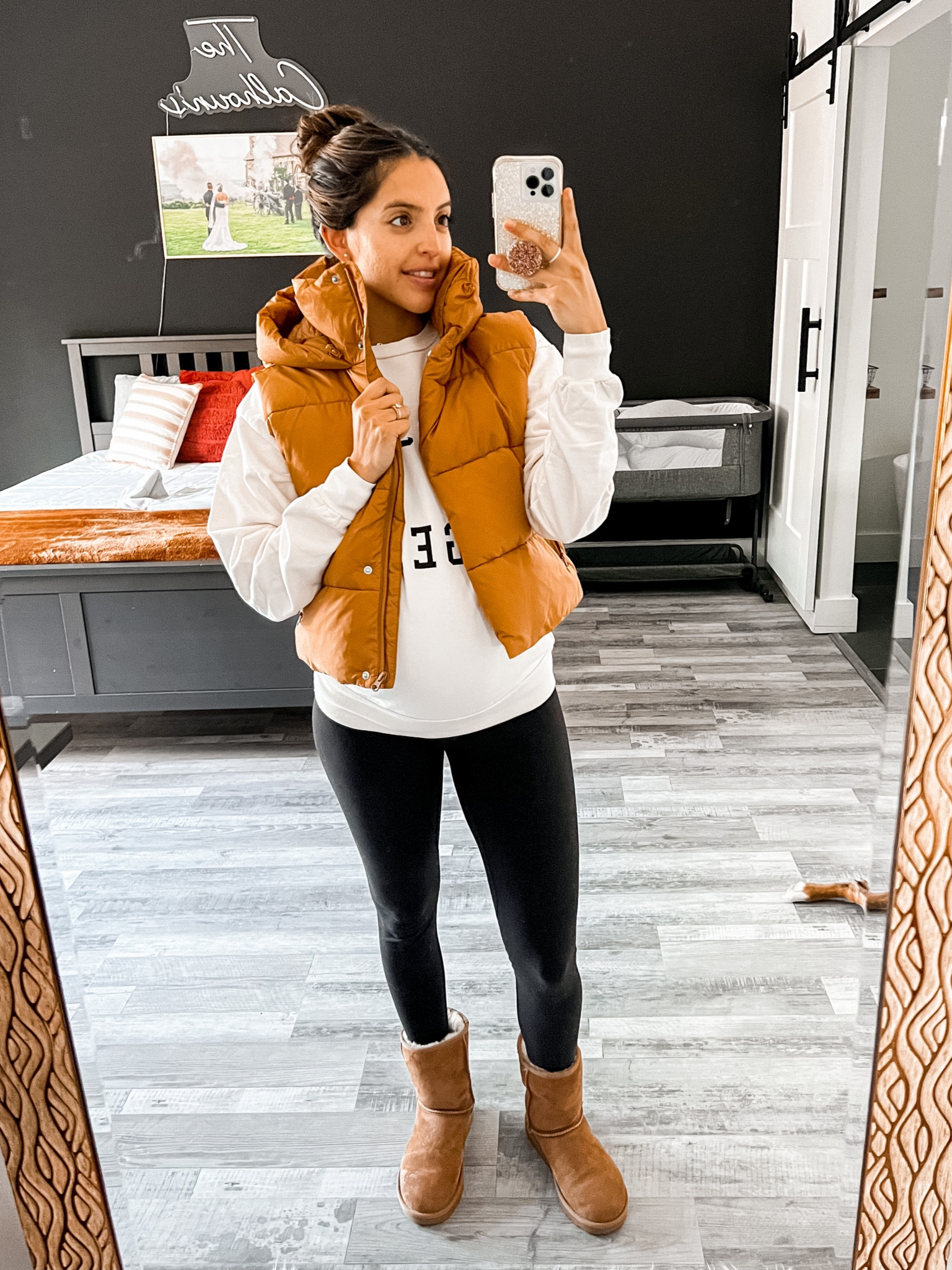 Casual Puffer vest outfit with hoodie. Flare leggings. Tasman Ugg