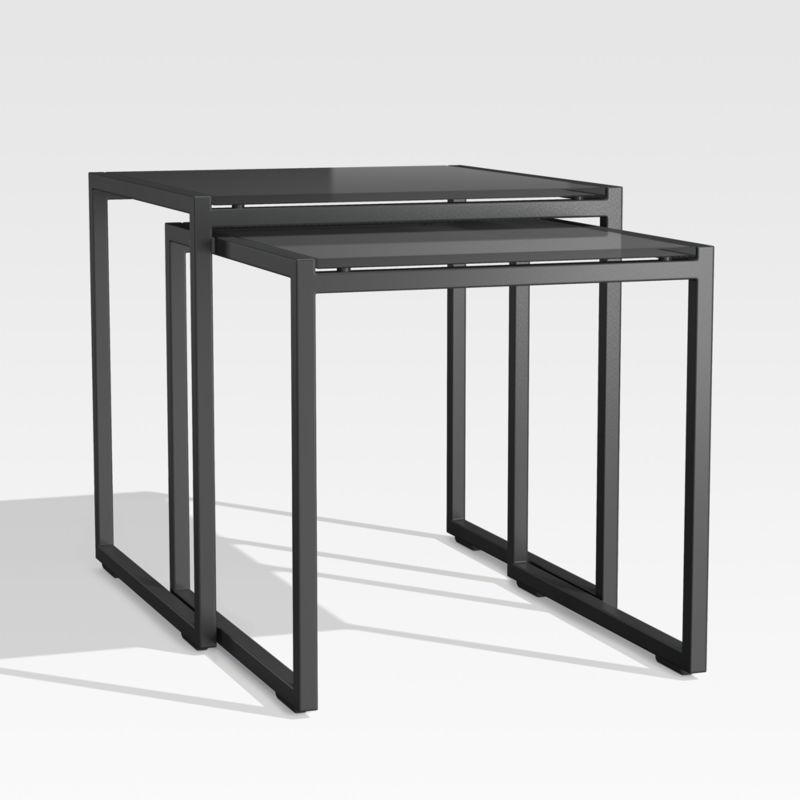 Dune Black Outdoor Nesting Tables with Black Painted Glass, Set of Two + Reviews | Crate & Barrel | Crate & Barrel