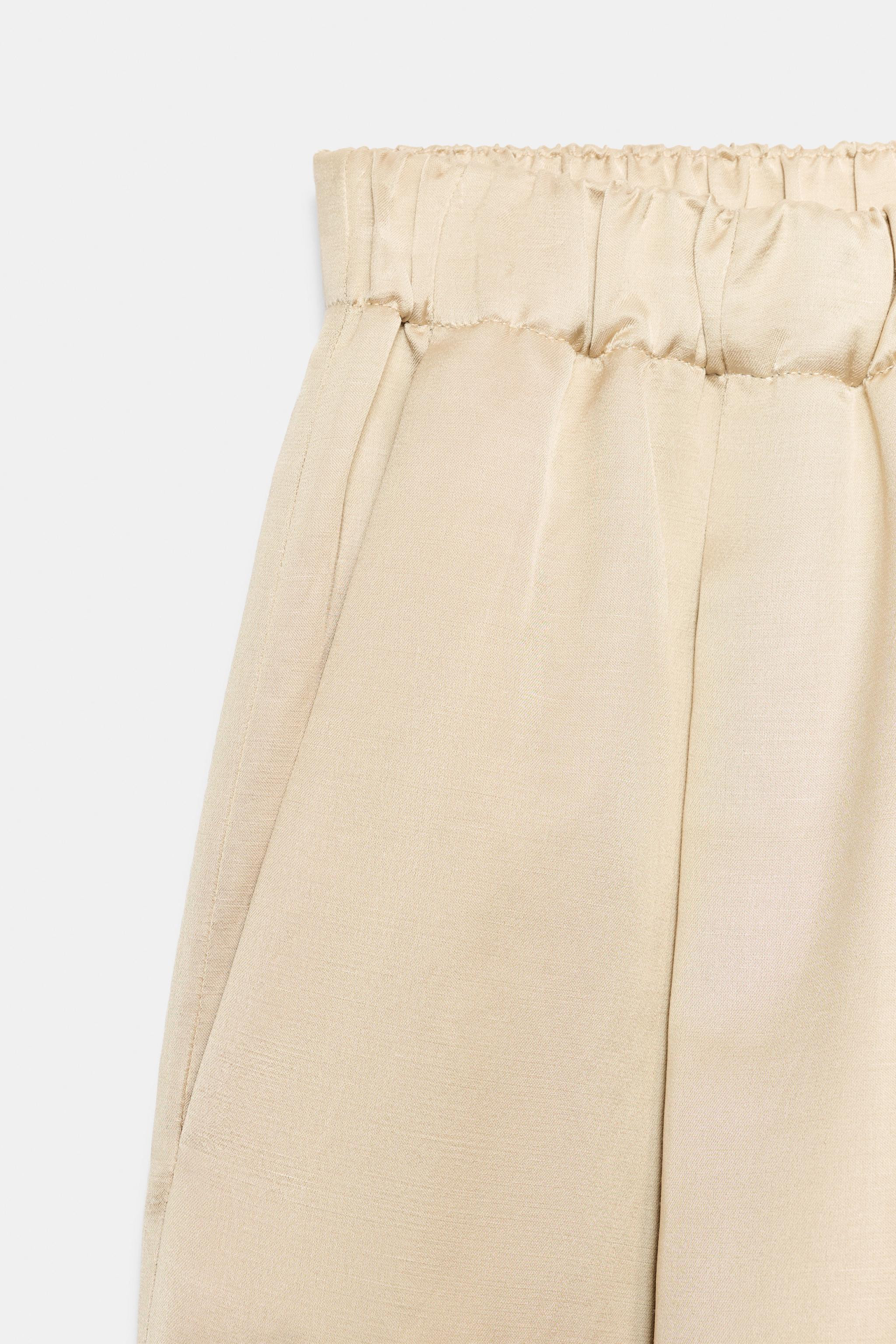 ZARA WOMAN COLLECTIONTrousers made from a 24% linen blend yarn. Featuring a mid-waist and an elas... | Zara UK