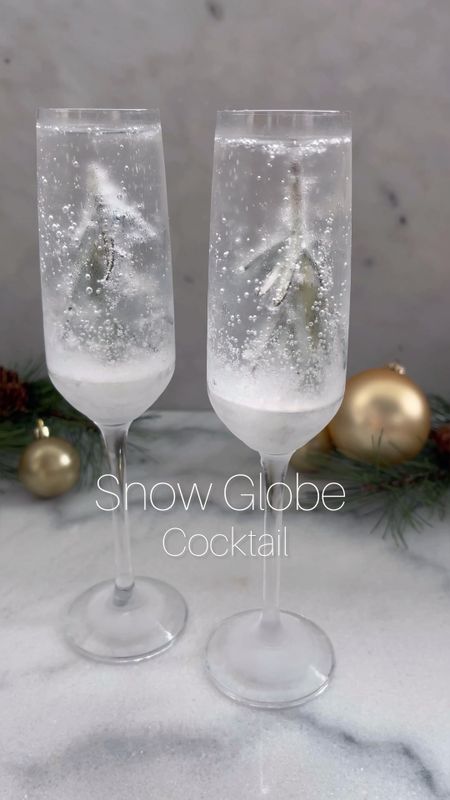 Snow Globe Cocktail

#snowglobedrink #snowglobecocktail #snowglobe #holidaydrinks #christmasdrinks #holidayparty #christmasparty #drinks #champagneglasses #crate&barrel #glassware



#LTKparties #LTKHoliday #LTKhome