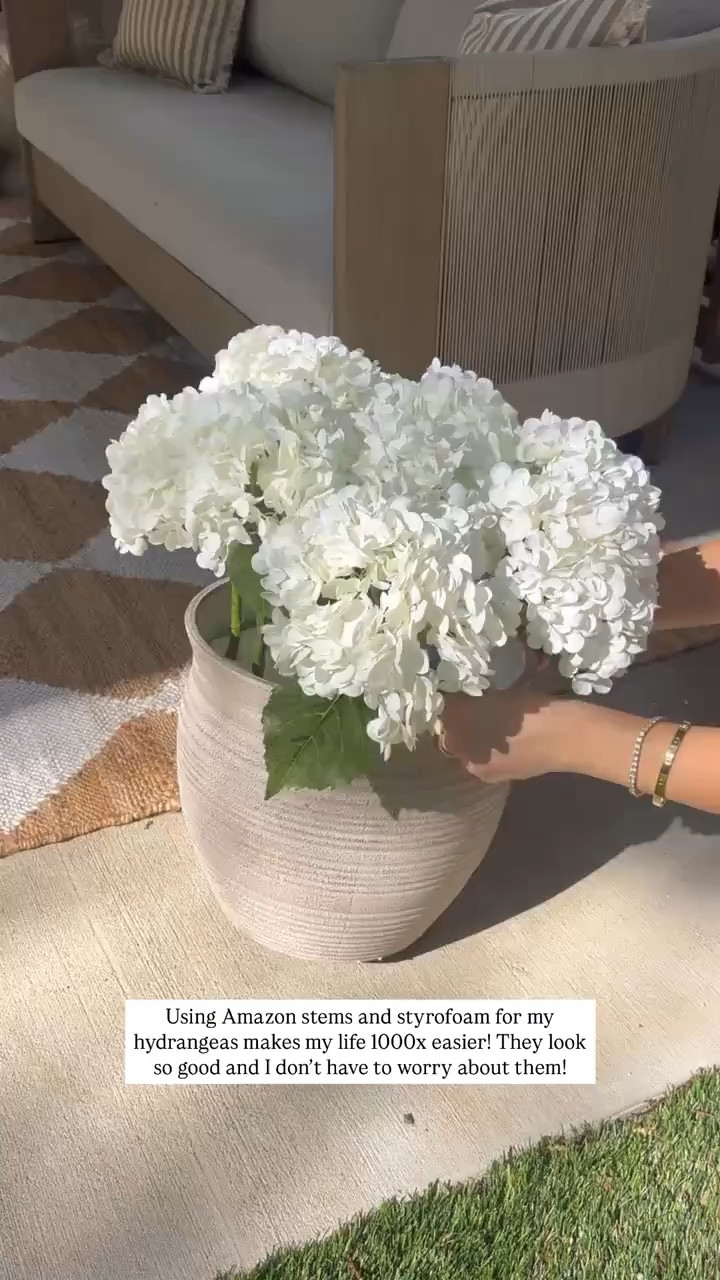 Styrofoam in the bottom of your planters are a game changer!!! 



Spring 2026, planter, faux flowers, summer, patio, home decor, hydrangeas, sidneymarieduke

#LTKHome #LTKSeasonal