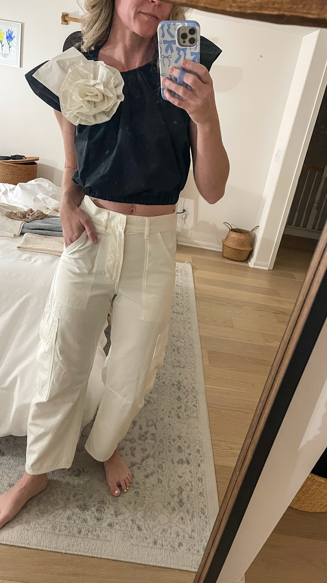 Received my smaller size in this top and it’s perfect. Wearing the XS. It’s a nylon material so it’ll be perfect for spring/summer and the elastic hem allows it to be adjusted to a more cropped style if desired. Pants are Citizens Marcelle cargos and fit large, size down. Wearing a 24. 

#LTKootd #LTKSeasonal