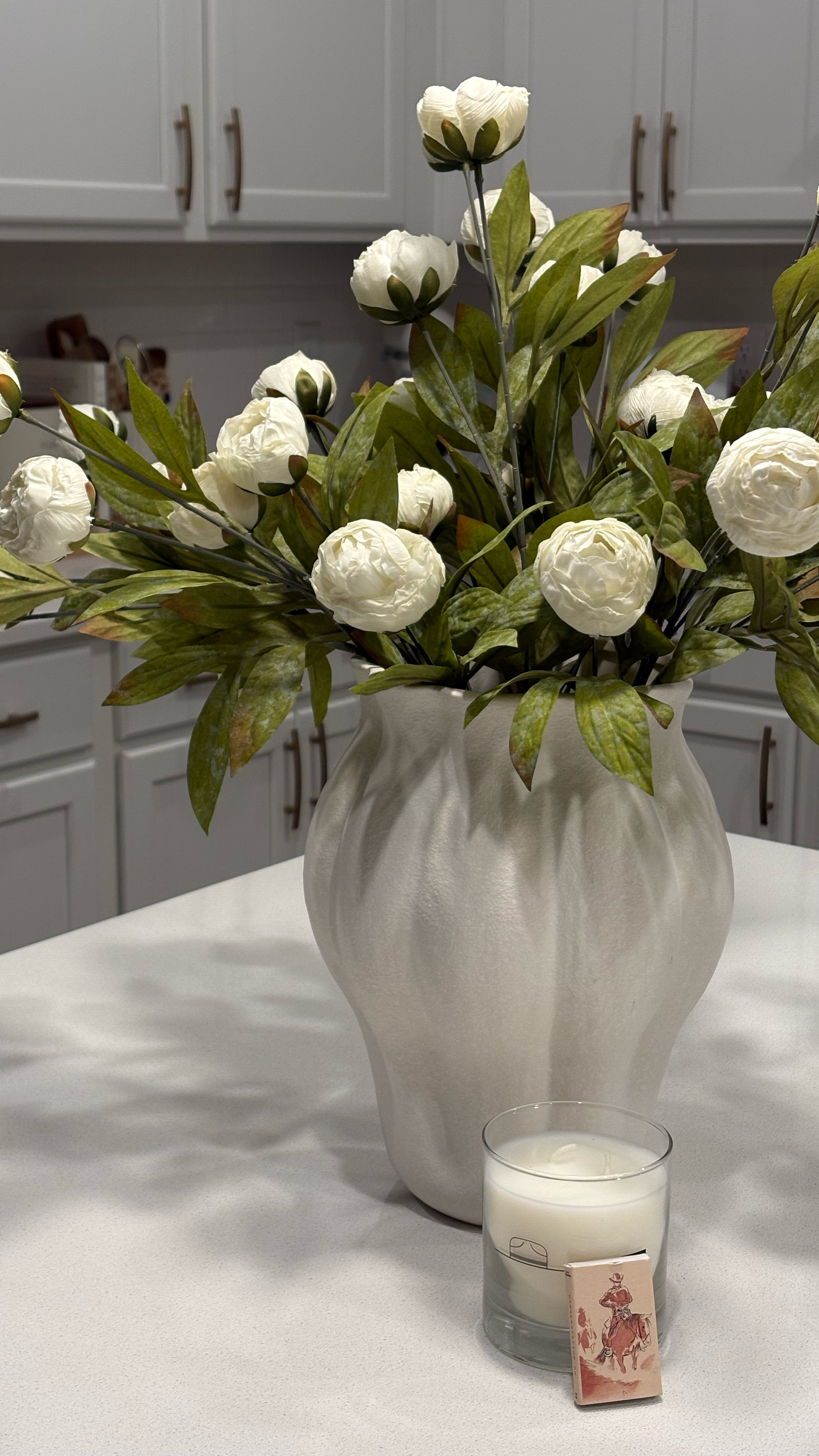 Clean white kitchen YES PLEASE. Home goods came through with this stunning vase!!! Florals are Michael’s. Most if not all kitchen decor is Magnolia Home 🤎✨

#LTKHome
