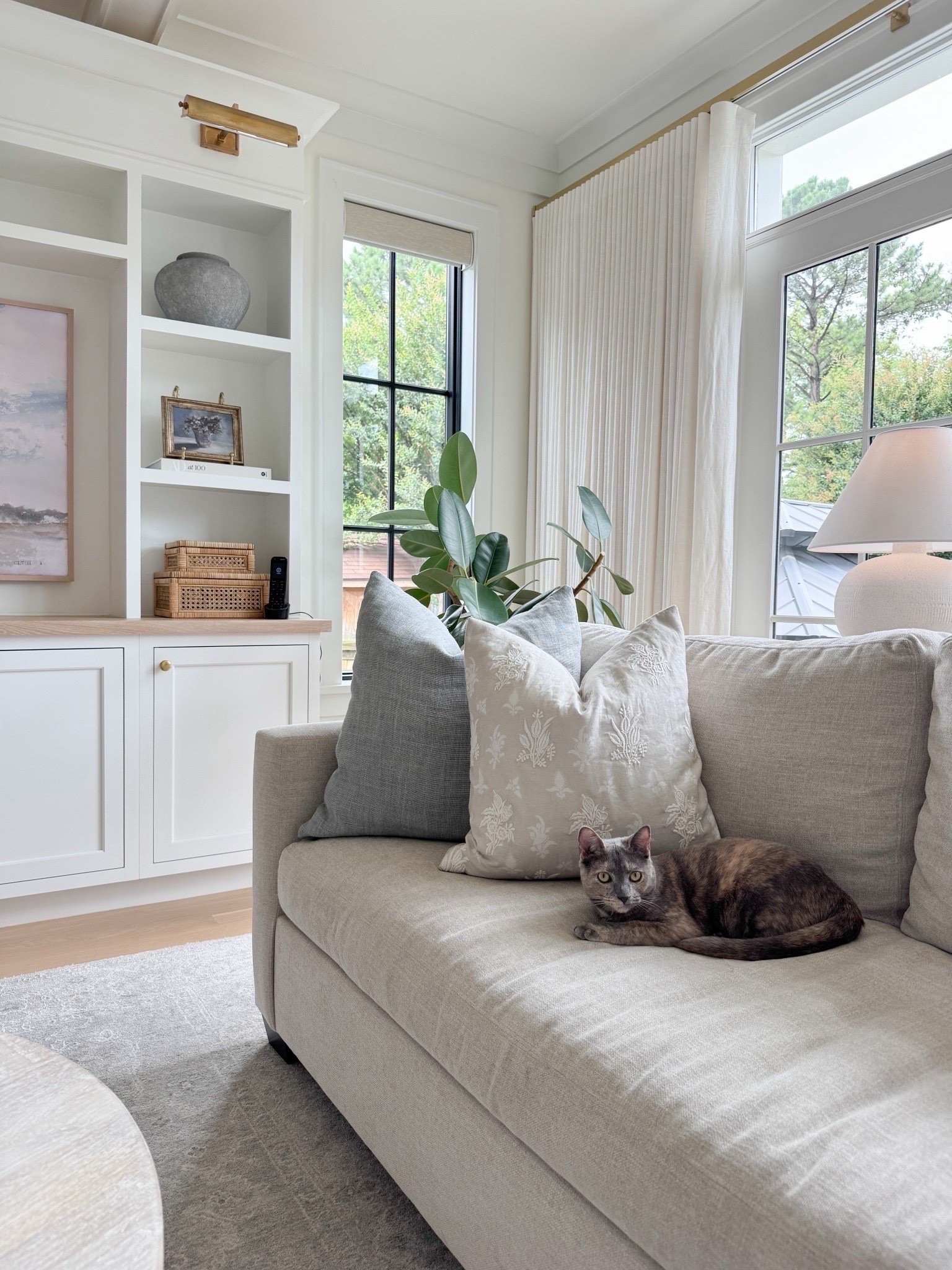 Pottery barn York sofa in Pebble. Pottery barn throw pillow, linen, blood print, entertainment center, media center, ivory curtains, shelf styling, modern coastal home



#LTKFindsUnder50 #LTKFindsUnder100 #LTKHome