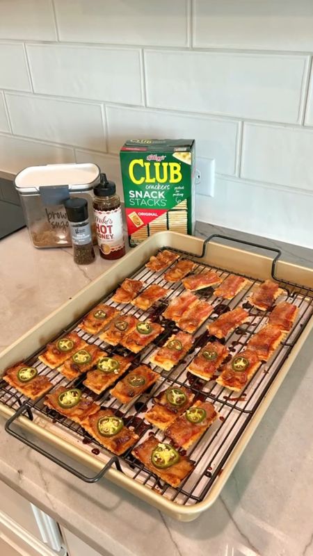 Have you I seen the Bacon Club Crackers? I decided I’d kick some up a notch, adding fresh cracked pepper, jalapeños and @mikeshothoney! So delicious! 

Recipe below:
1 package bacon
30 club crackers
Pepper (fresh cracked)
1/4-1/3 cup Brown sugar
Jalapeño slices, optional
Mike’s Hot Honey, optional

Preheat oven to 350°F. Line a baking sheet with parchment paper and add cooking rack atop the baking sheet. Cut bacon strips into 3-4 pieces. Layout club crackers, then top with bacon, fresh cracked pepper and brown sugar. Add jalapeño slices and a drizzle of hot honey, if desired. Bake for 20-22 min or until bacon is done.

I’d suggest refraining from thick cut bacon because it takes longer to cook which could burn the crackers.

#appetizer #bacon #recipes #hothoney #crackers #sweetandspicey #saltyandsweet #viralrecipes #momscooking #homemade #homecooking #familyrecipes #damedayrecipes #partyappetizers #dfwmoms #dfwcreators #dfwinfluencer #dfwblogger

#LTKunder50 #LTKfamily #LTKhome