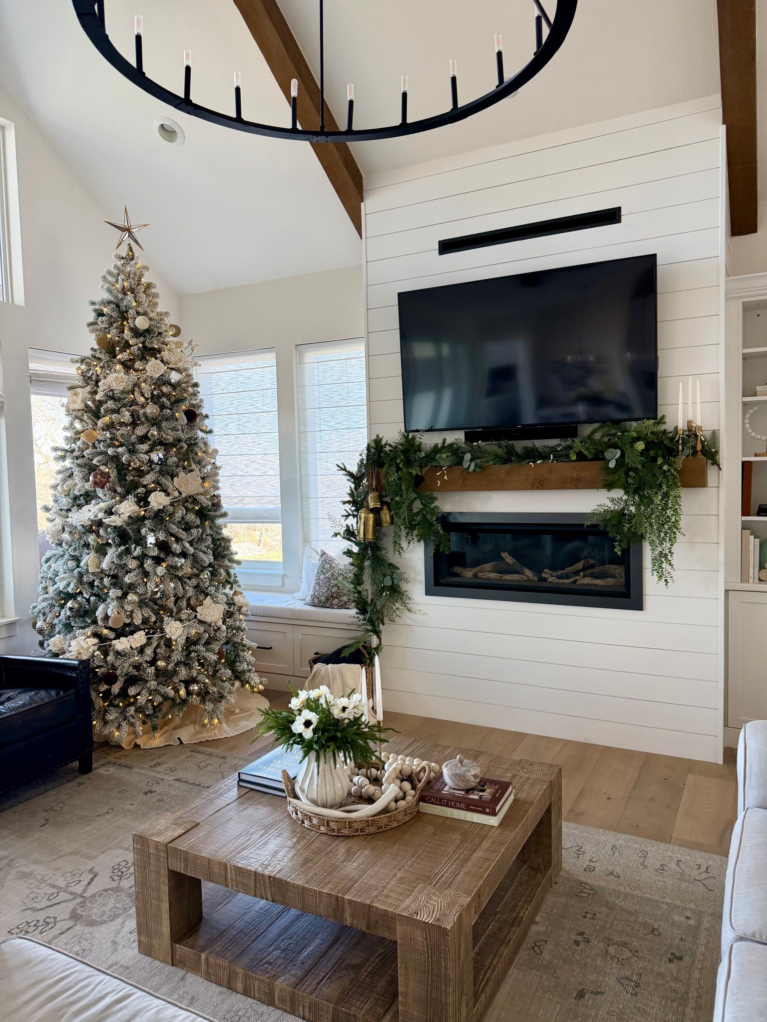 Cozy Christmas living room magic.
Soft neutrals, warm wood tones, fresh greenery, and a flocked tree make this space feel calm and festive all at once. If you’re styling your home for the season, these pieces are the perfect blend of cozy + elevated 🤍
Tap to shop the tree, garland, stockings, chandelier, coffee table decor, rug, and more holiday favorites!

#HolidayHomeDecor #CozyChristmas #NeutralChristmasDecor #LivingRoomDecor #ChristmasTreeInspo #OrganicModernHome #ModernFarmhouseStyle #StyledSpaces #HolidayDecorInspo 

#LTKHoliday #LTKHome #LTKSaleAlert