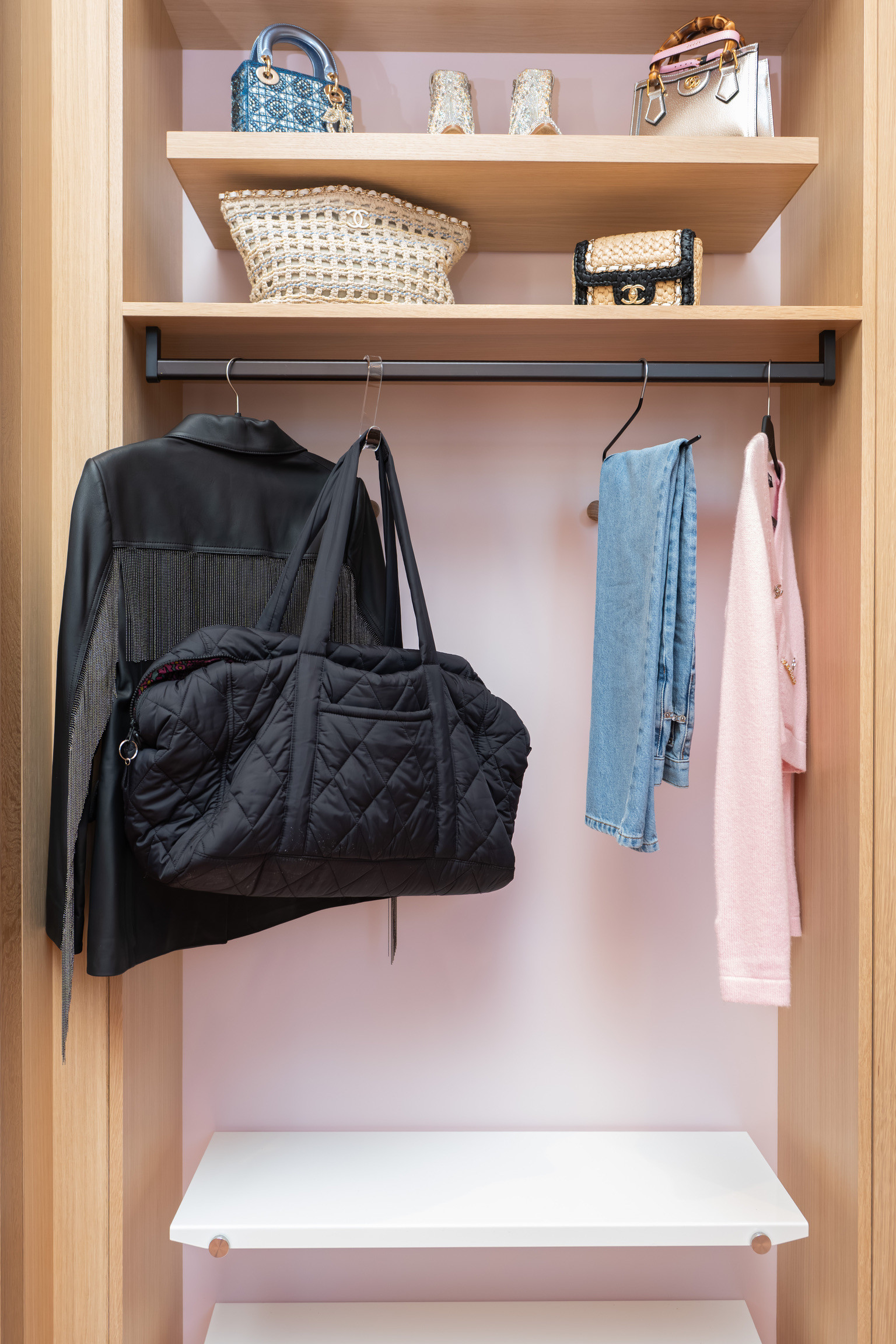 In Angela Garcia’s closet, one entire bay was designed specifically for travel — allowing Angela to “shop her closet,” style full outfits, and build her travel wardrobe in one place before every trip.

#LTKHome #LTKTravel #LTKgrwm