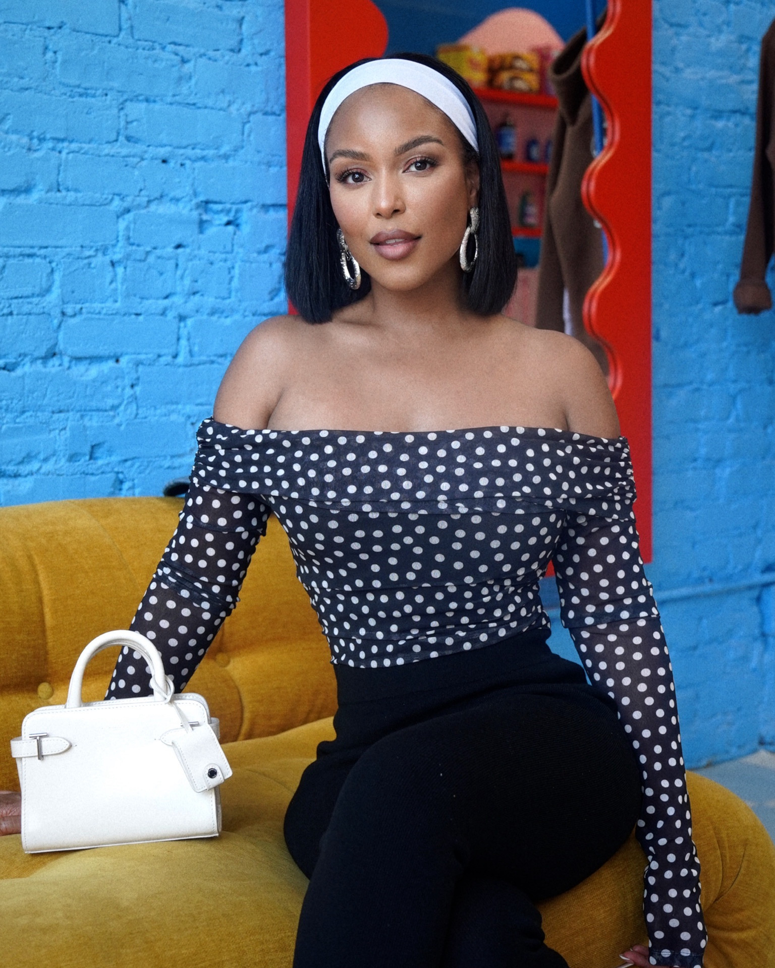 Serving soft glam & polka dot charm 🎀🖤 This off-the-shoulder top is giving classy but playful, and don’t get me started on this mini white bag, obsessed. Linking everything you need to recreate this fit 💫 

#LTKFindsUnder100 #LTKStyleTip #LTKFindsUnder50
