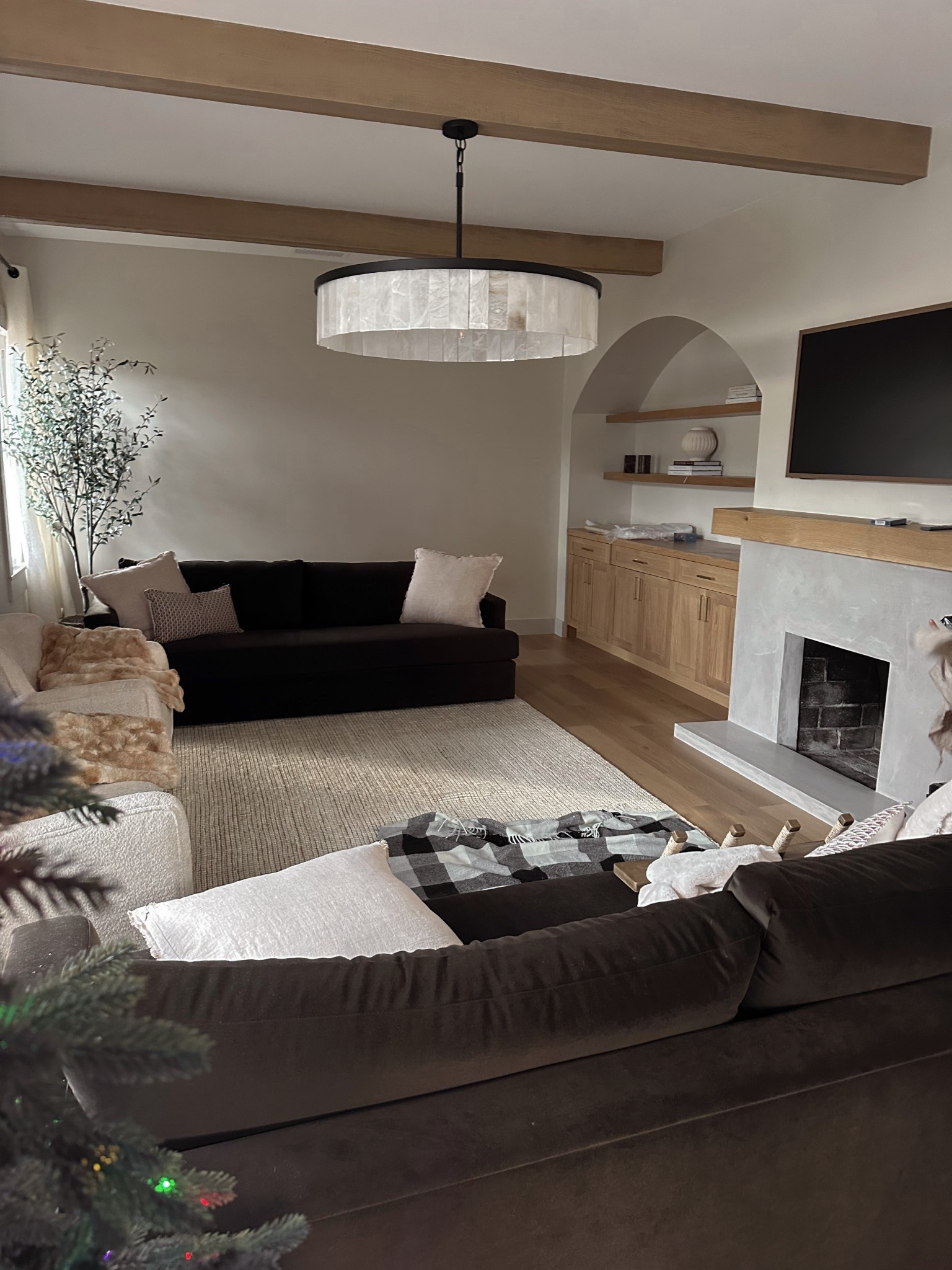 Starting to put the living room together at @theitsybitsybungalow. Waiting for large coffee table to arrive and artwork 
Organic and earthy feel


#LTKOver40 #LTKHome