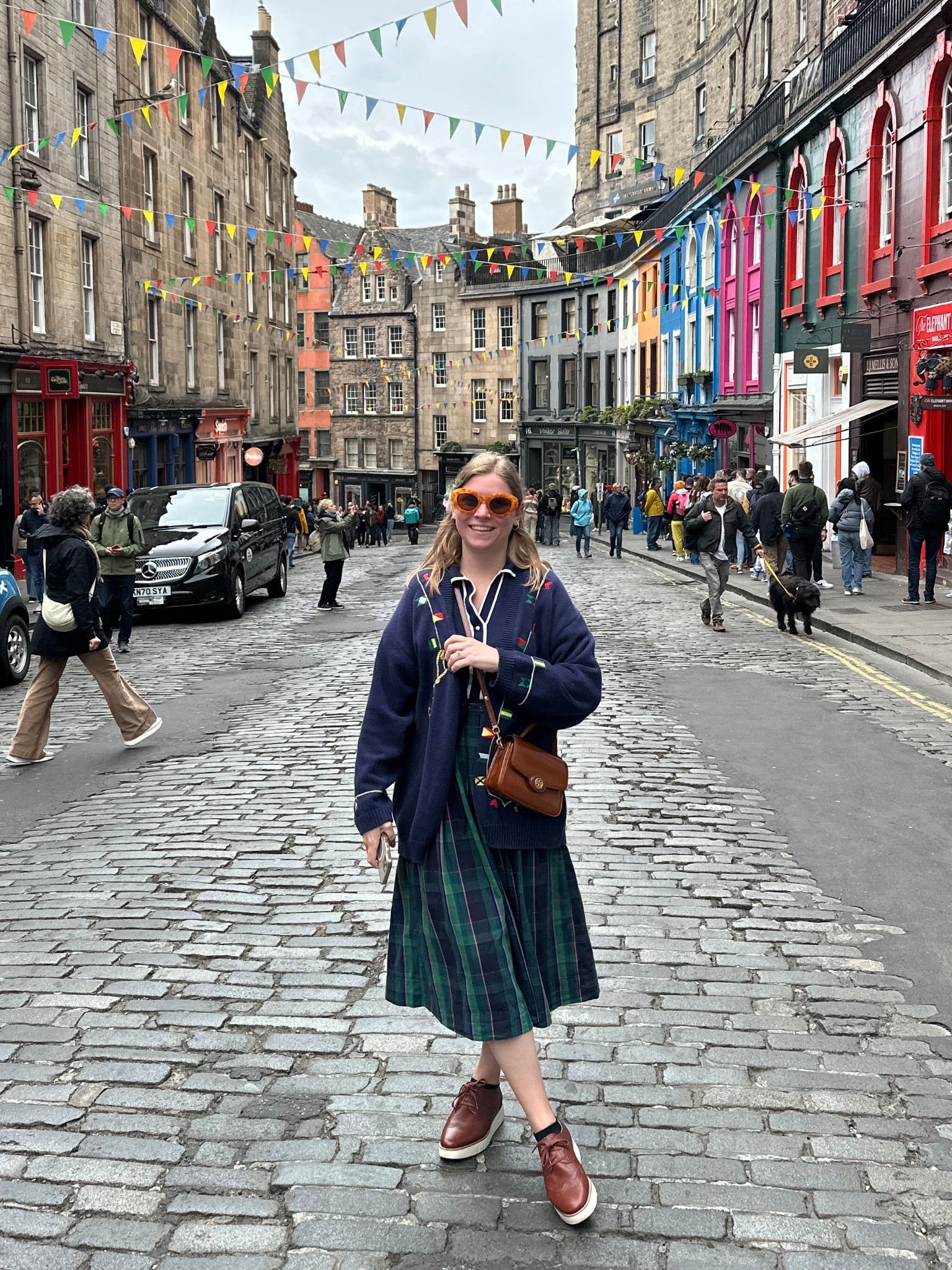 When in Scotland, wear tartan. This tartan skirt with an oversized cardigan was perfect for a rainy day in Edinburgh. And don’t forget the water resistant shoes! 