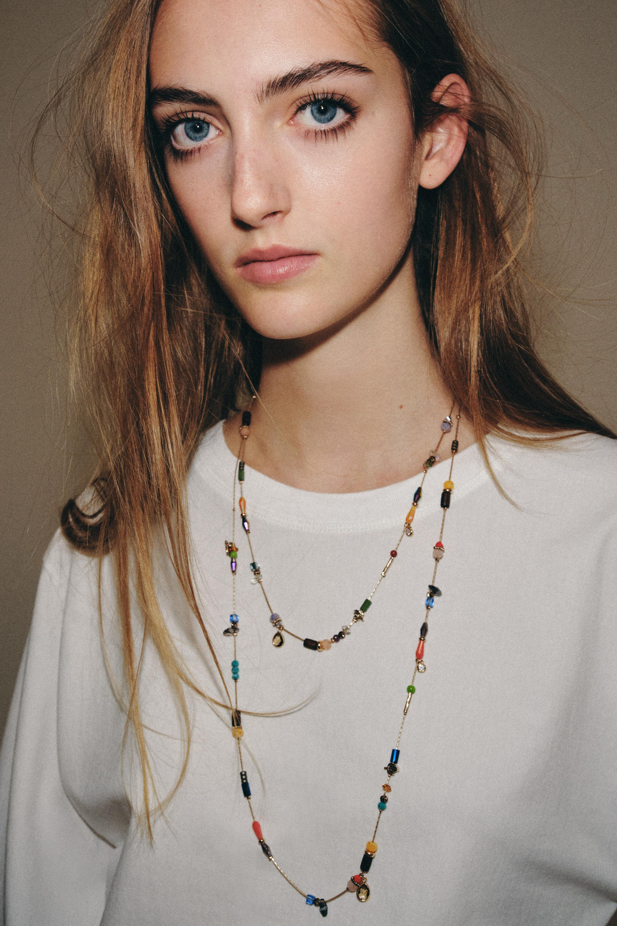 Pack of two necklaces in different lengths of metal cord. Pendants featuring various beads made o... | Zara US