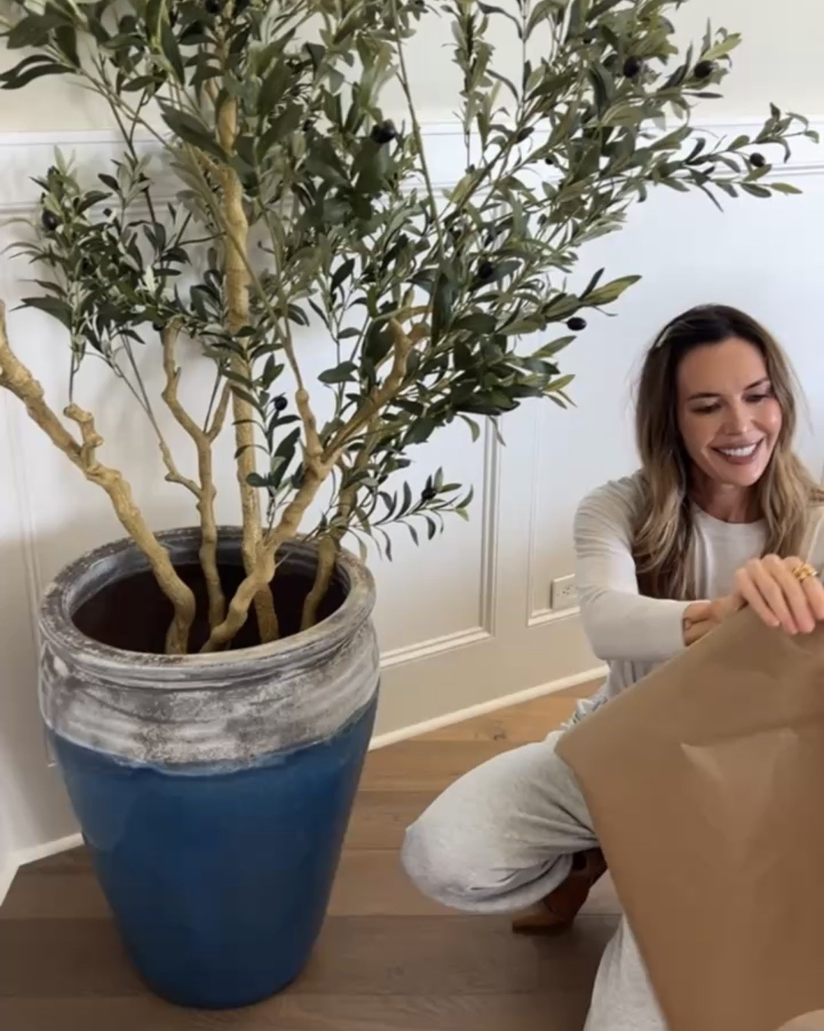 The easiest way to make a faux olive tree look a little more elevated. One of my favorite home hacks by far.

A little deer moss around the base instantly makes it look more finished, and adding a small light inside gives it the prettiest glow at night. Such simple details, but they make such a difference.

#LTKHome #LTKSeasonal