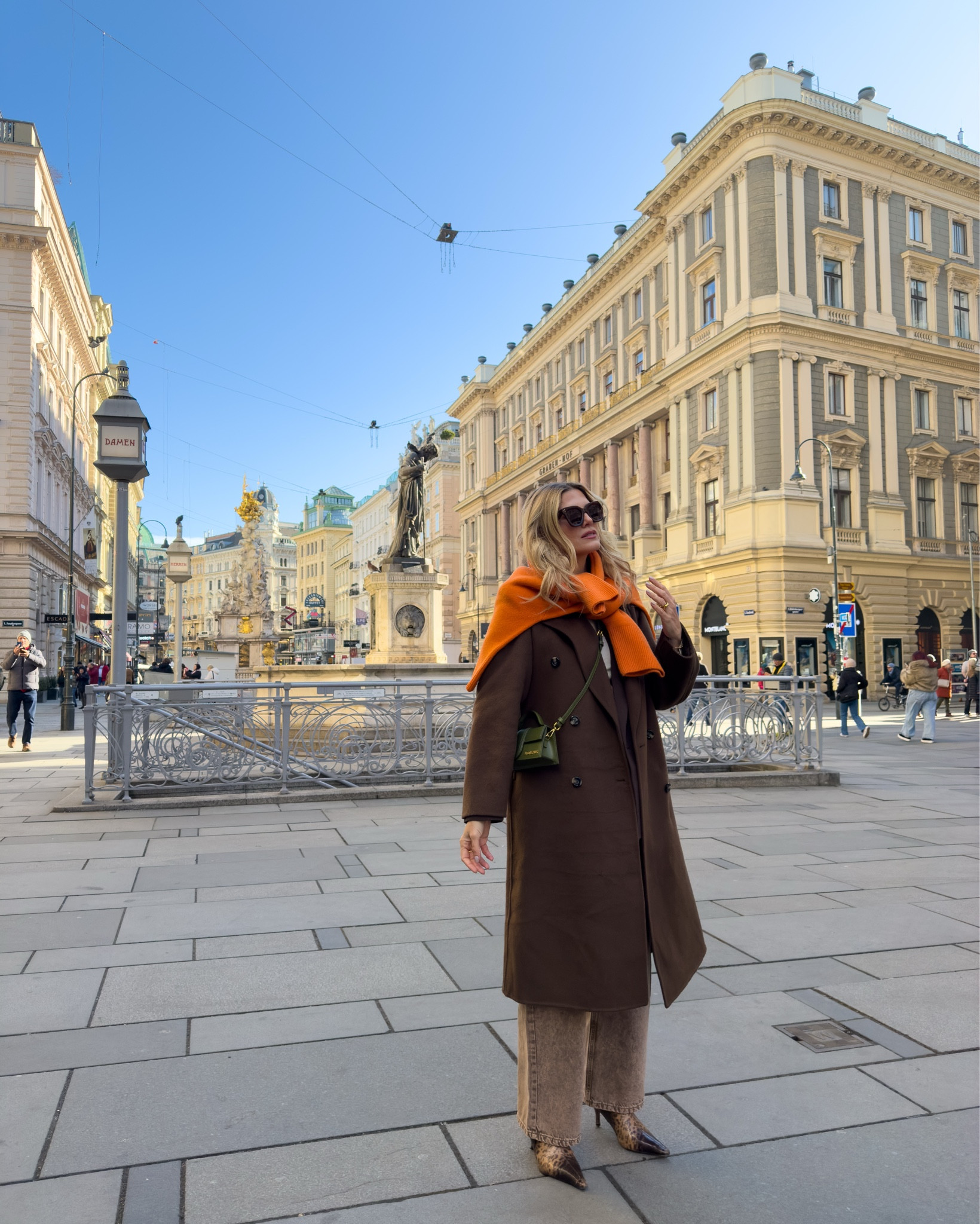 Tonal brown outfit in Vienna. 

Love these acid wash jeans and the brown blazer from nobody’s child and brown coat from Mango. I added a pop of colour with this orange Zara jumper! 

#LTKuk #LTKtravel #LTKeurope
