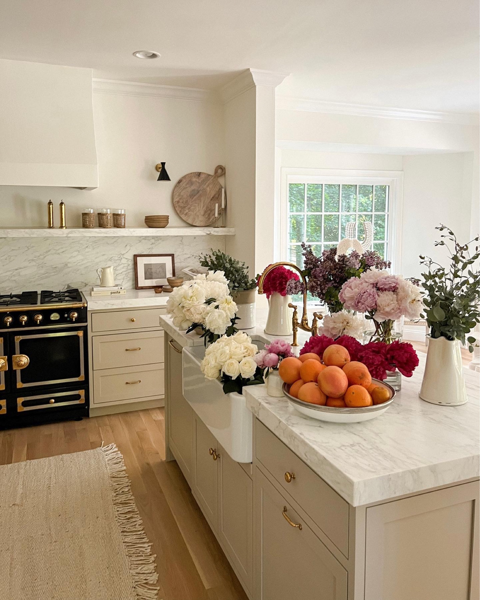 Kat Jamieson shares her farmhouse kitchen. Marble, stove, oven, sink, brass, cutting board, home decor, interiors, interior design. 

#LTKhome