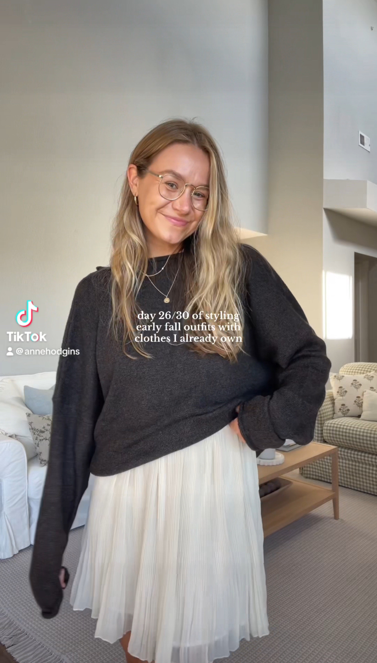 Sweater is called to surf cardigan, worn backwards, size medium. Skirt is thrifted. Shoes are Franco Sarto. Glasses are Eyebuydirect 🤍