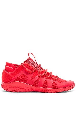 adidas by Stella McCartney CrazyTrain Bounce Sneaker in Core Red & White | Revolve Clothing (Global)