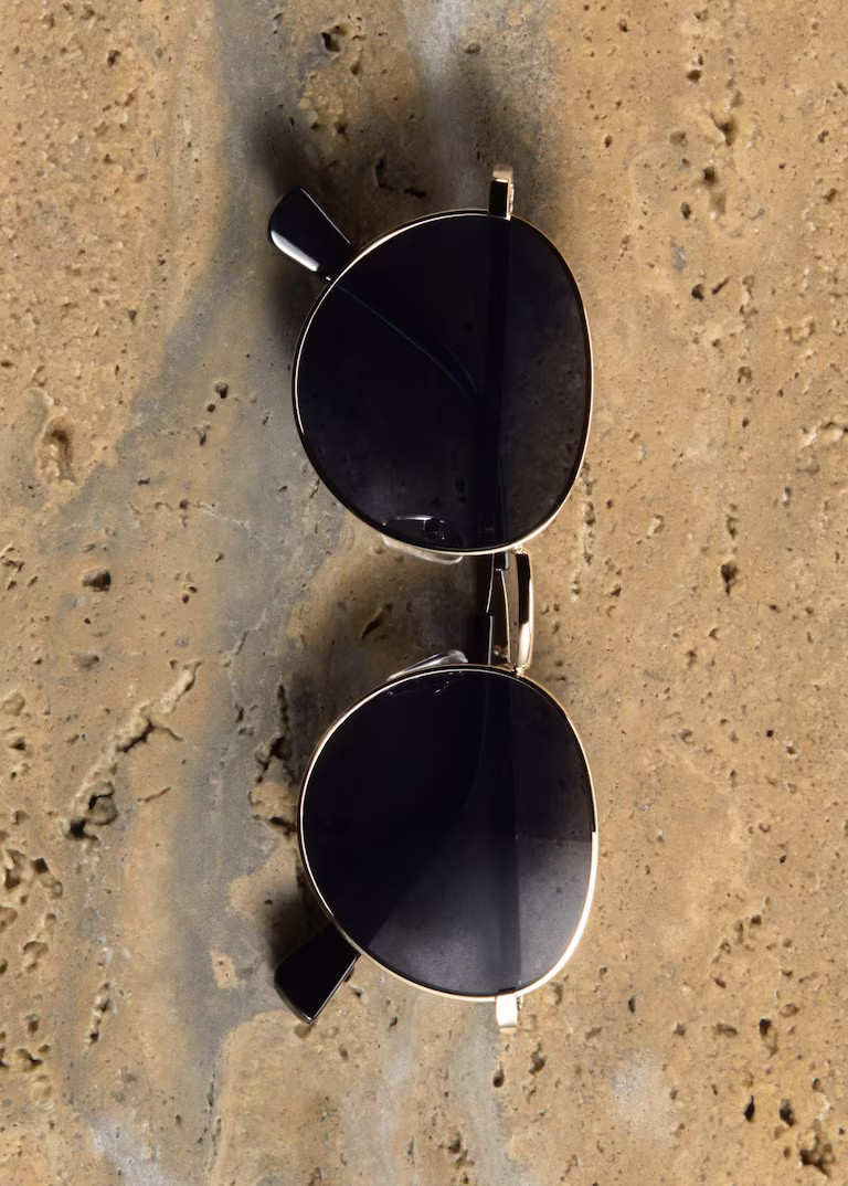 Round metal-rimmed sunglasses -  Women | Mango USA | MANGO (US)