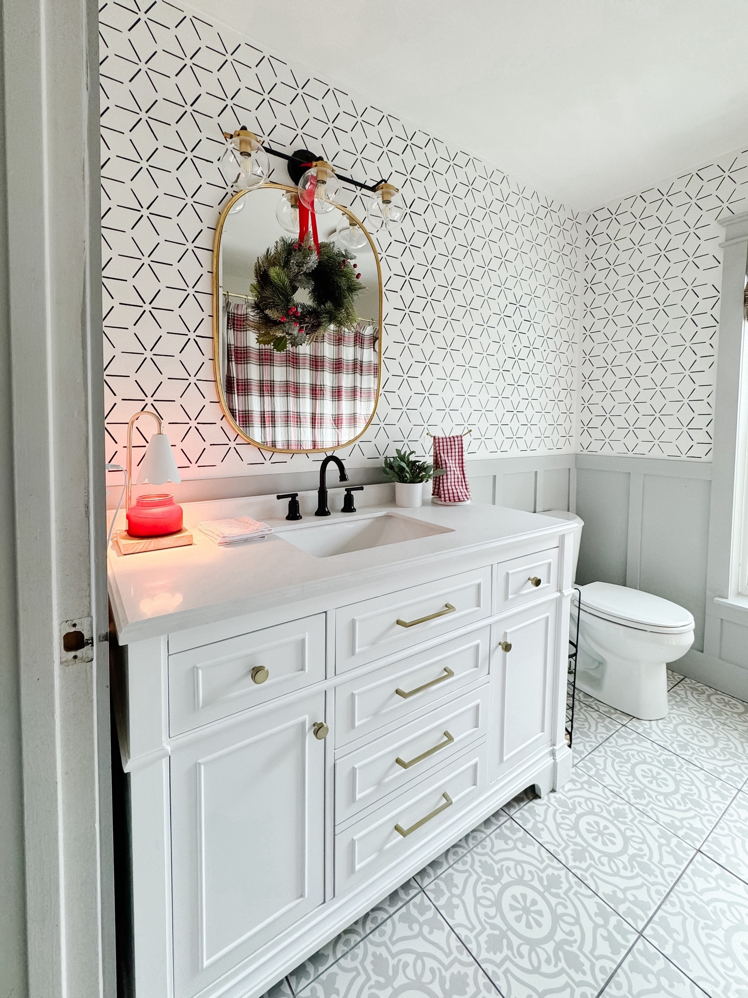 Our bathroom is decked out for the holidays! I love updating the shower curtain and bath mat for Christmas 🎅🏽 quick little swaps make it feel so festive. 

Guest bathroom. Holiday decor. Small bathroom  

#LTKSeasonal #LTKhome #LTKHoliday
